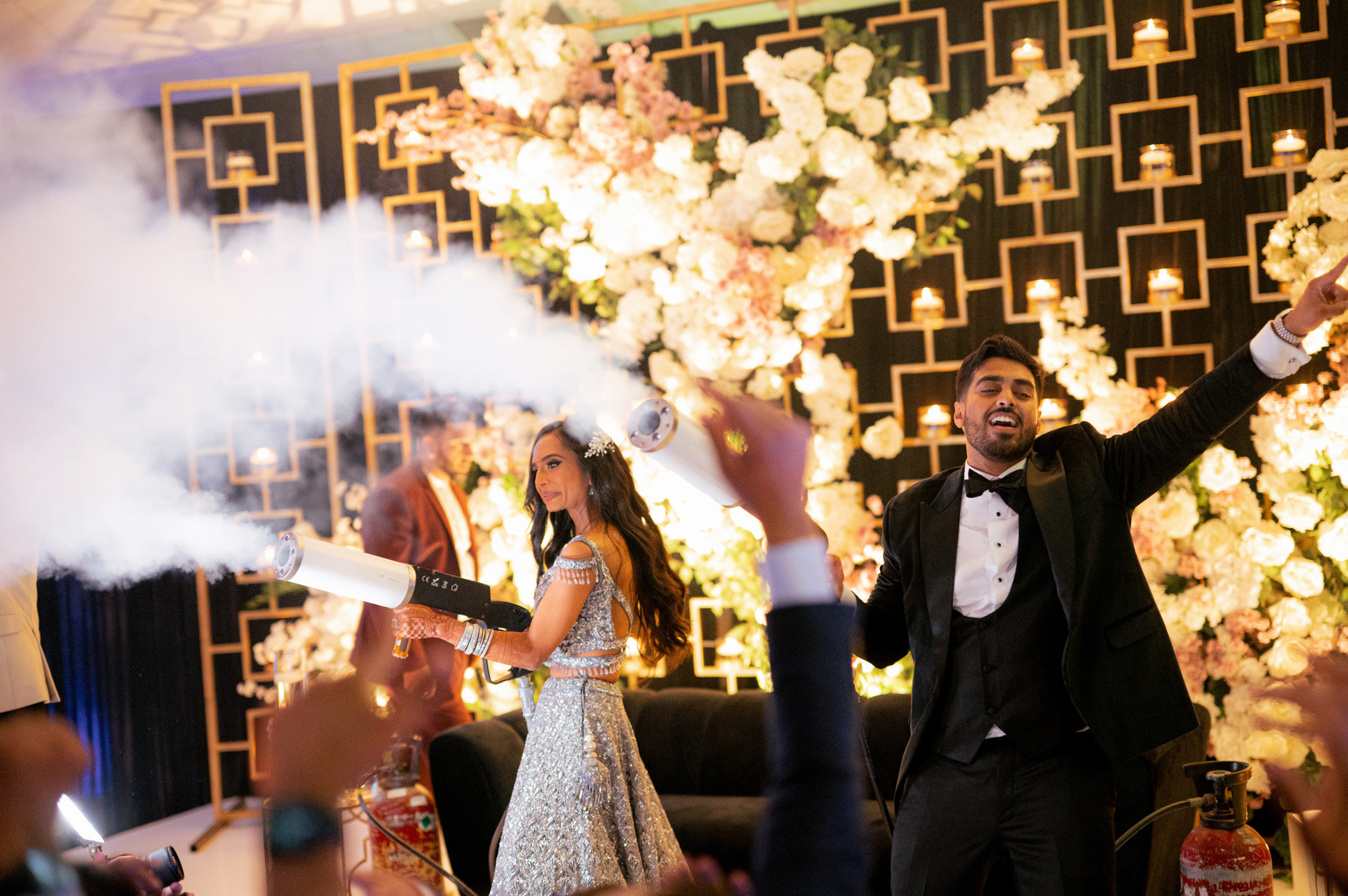 a man and woman are dancing at a wedding