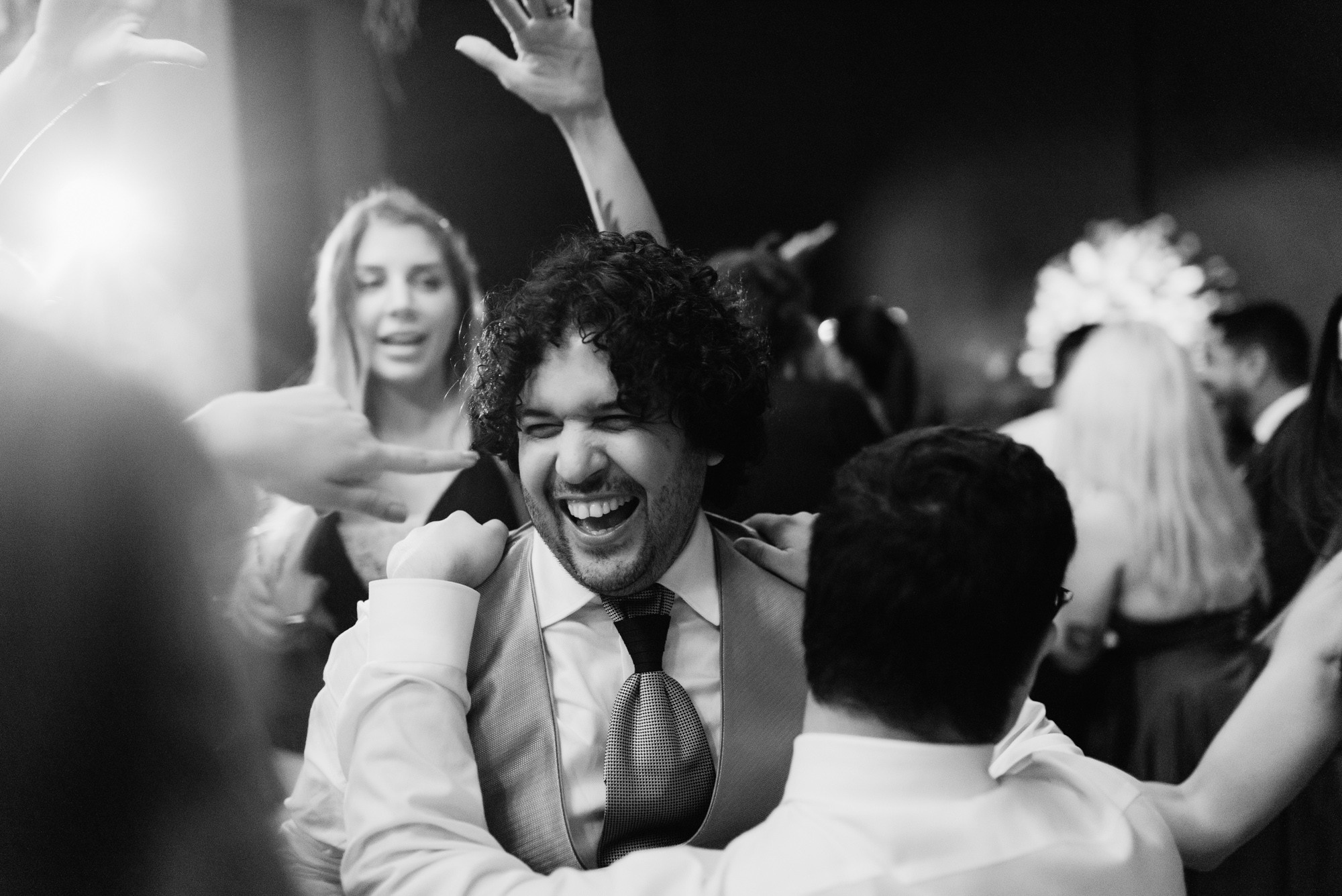 a man is dancing with his friends