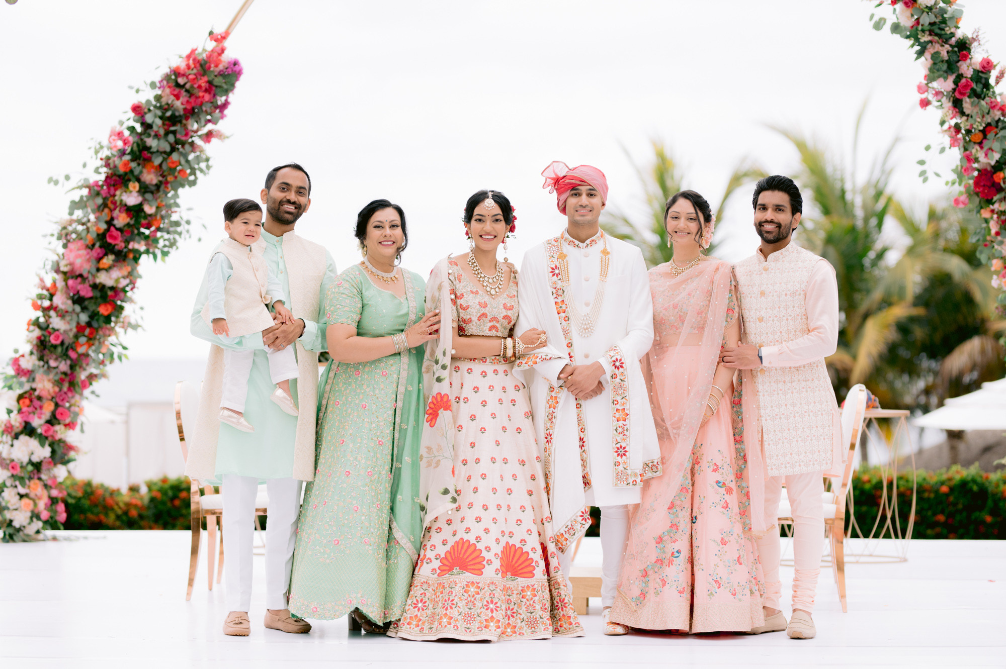 a wedding party in a tropical setting