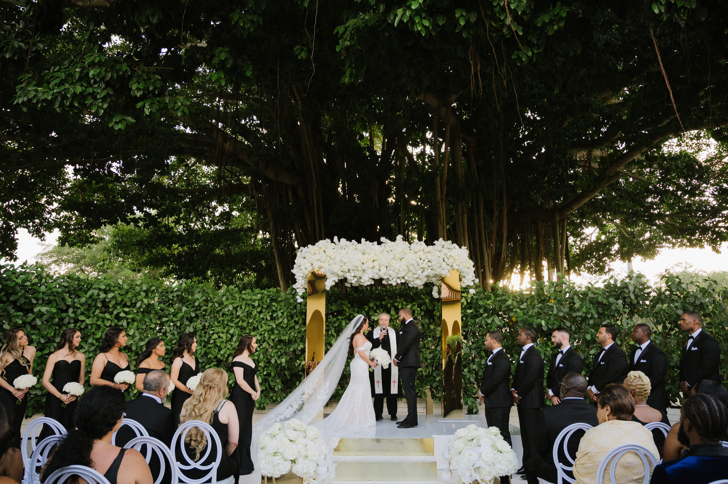a wedding ceremony with a couple and their guests