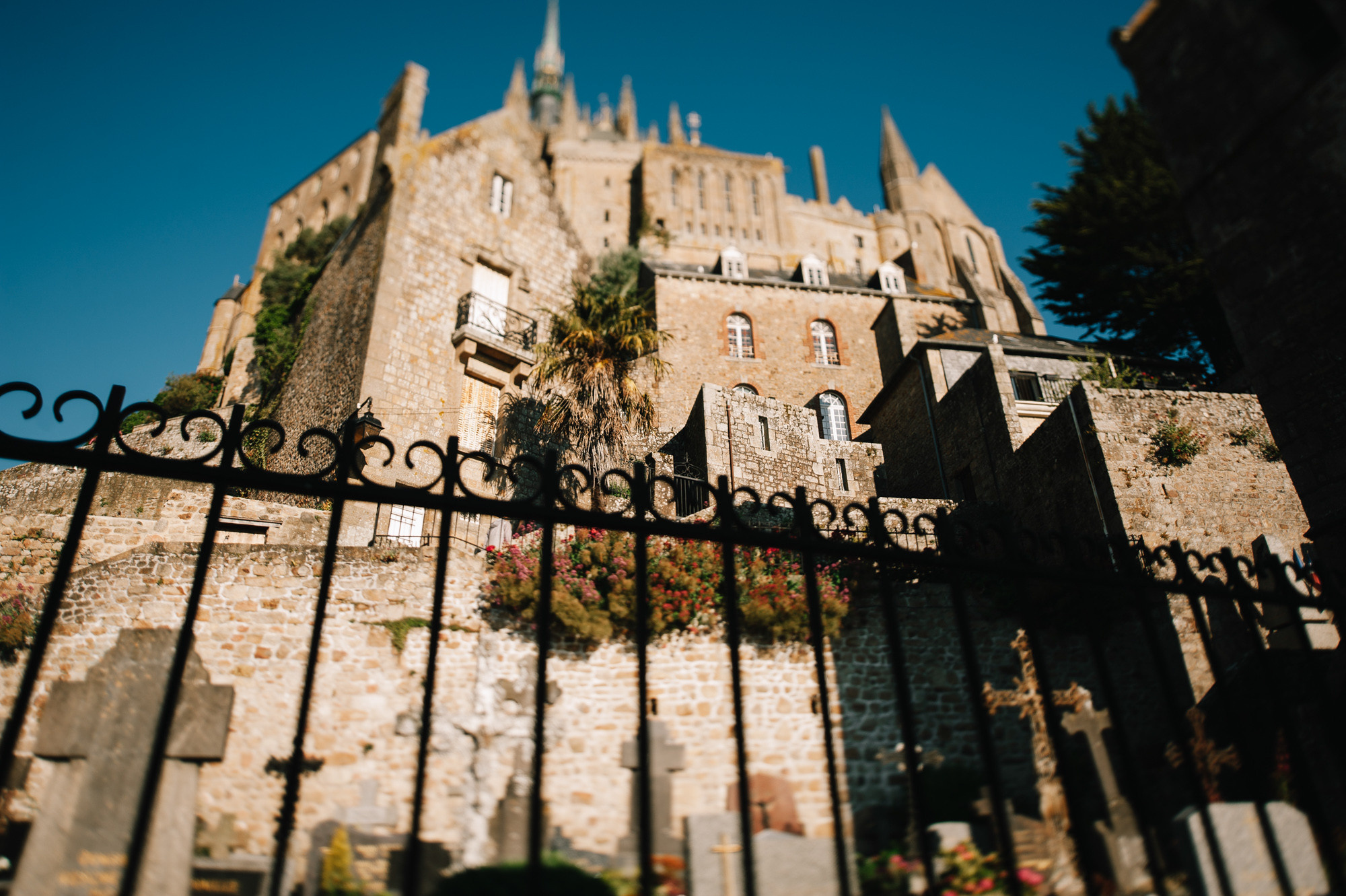 a church with a gate and a clock