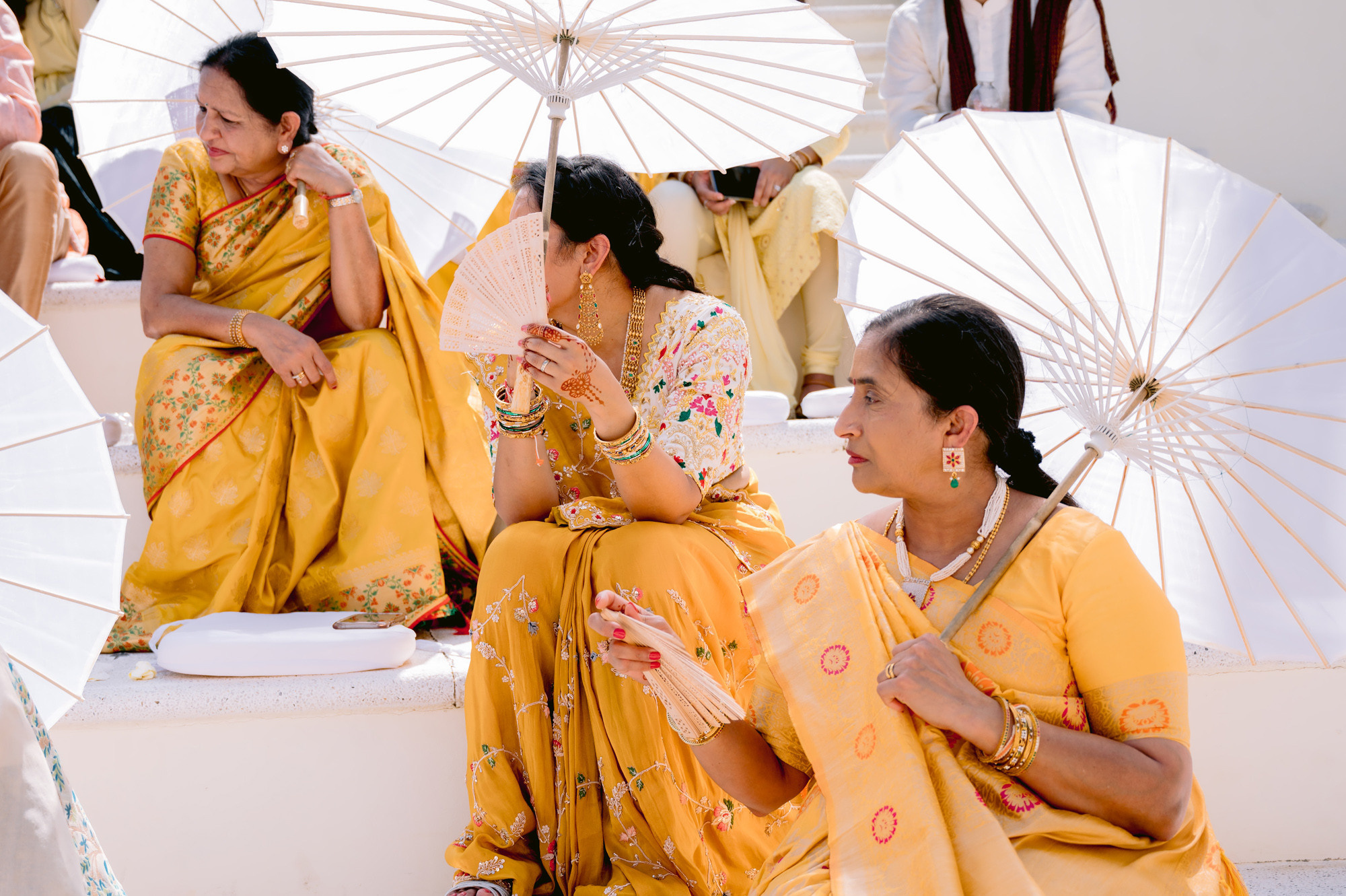 a woman in a yellow sari
