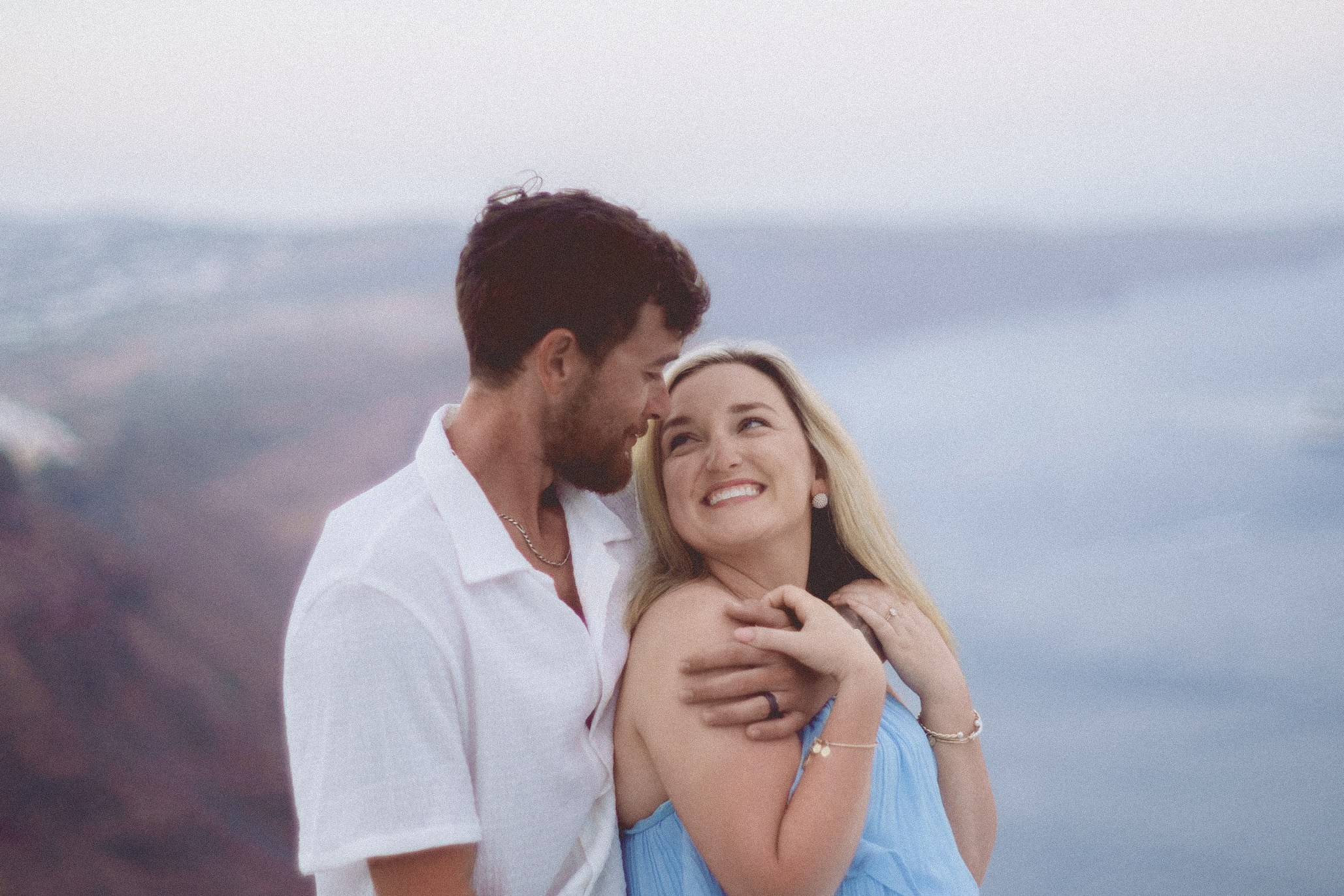 Couple sunset photoshoot in Santorini. Photographer in Greece Kristina