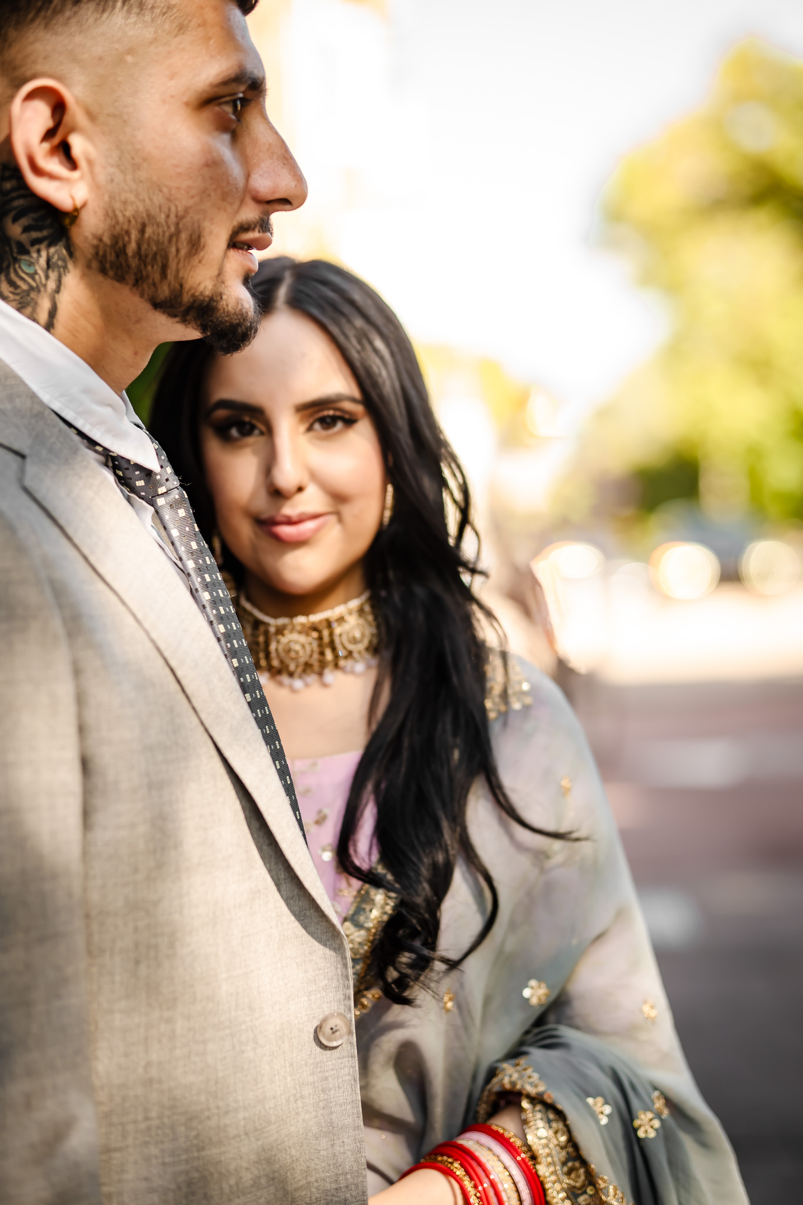 a man and his bride standing near each other