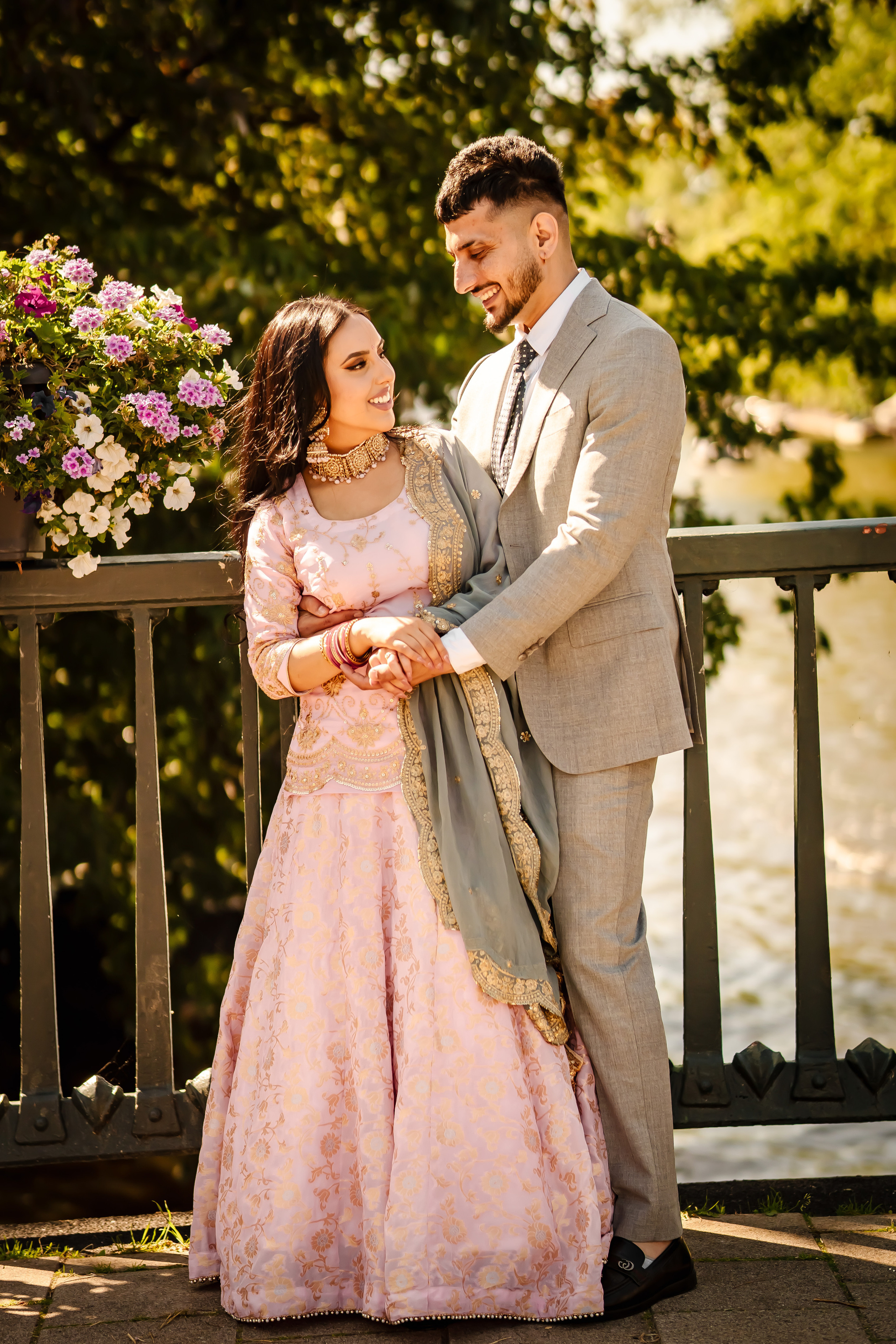 a man holding his wife from behind