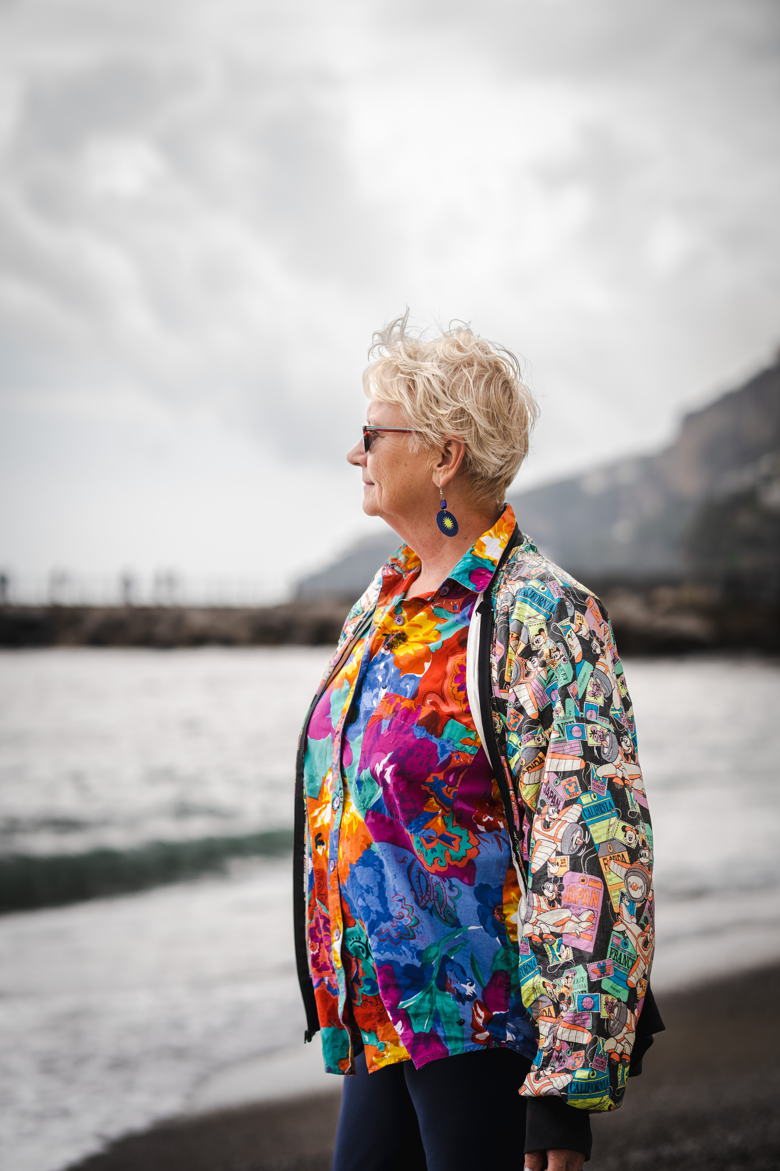 Side-view portrait of American lady in Amalfi beach