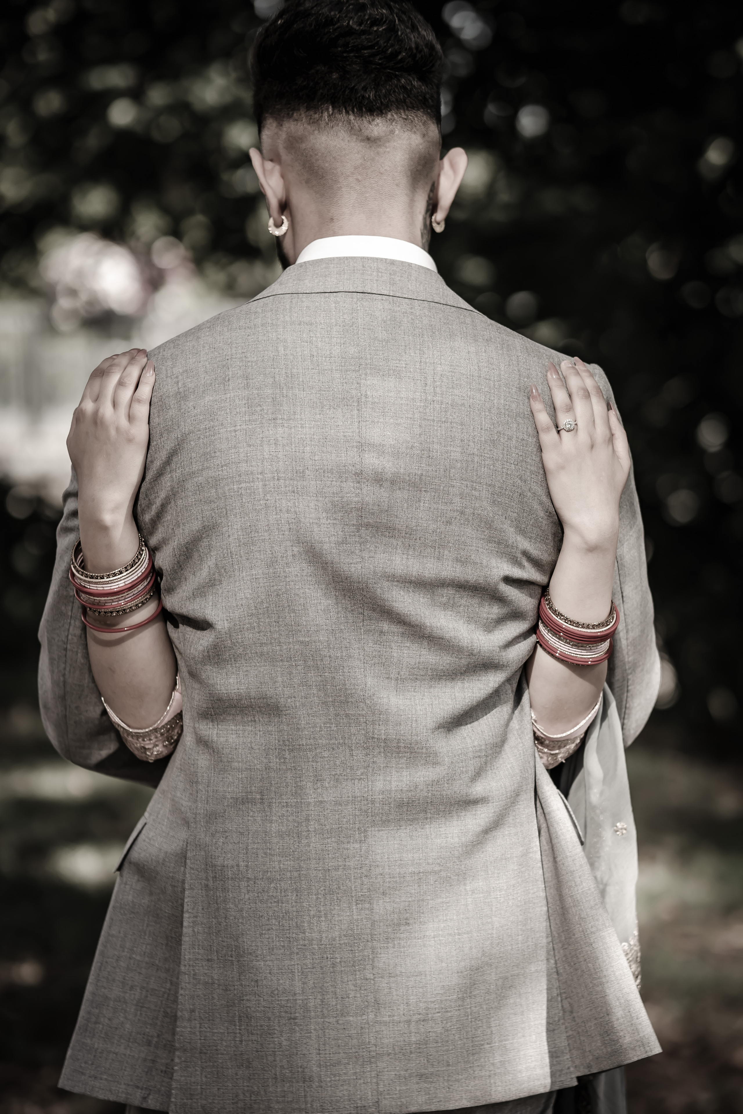 a man and woman holding each other