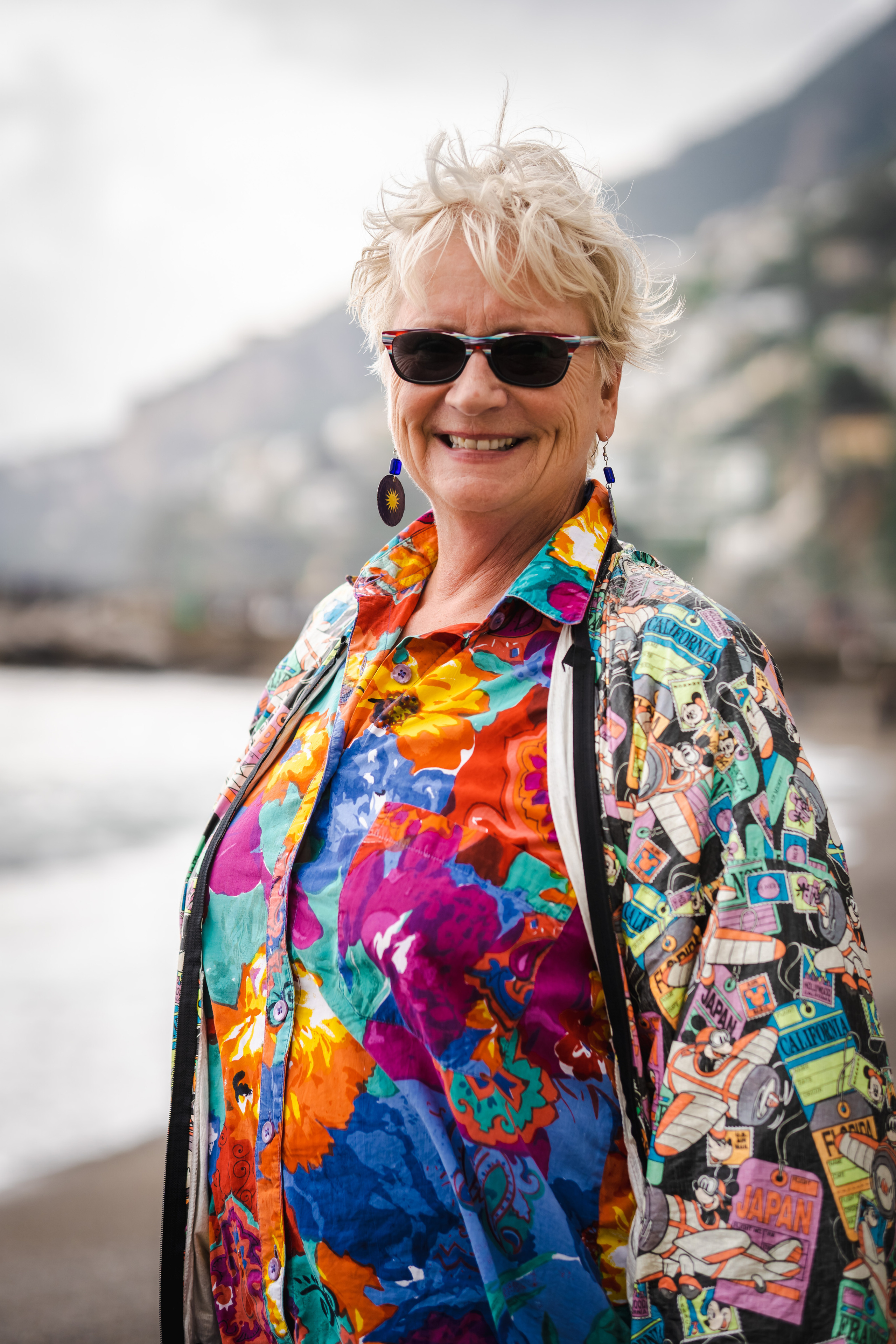 Happy American old lady in Amalfi beach