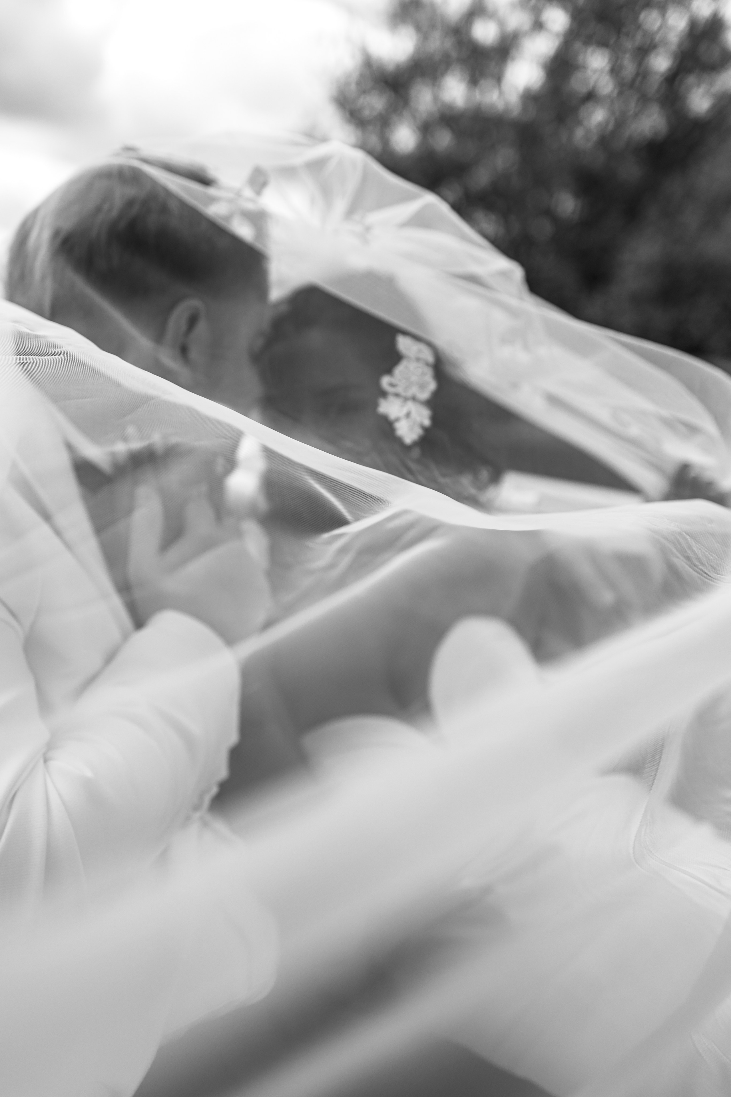 Elegant wedding portrait of bride and groom walking through the streets of ParisRomantic elopement moment captured in soft evening light in Paris, FranceLuxury wedding ceremony setup in a historic French venue with natural floralsCandid black and white photo of a couple at their city wedding in London, UKTimeless couple portrait in front of Marylebone Town Hall, LondonEditorial-style bridal preparation in a classic townhouse in the heart of LondonSoft light bridal portrait in a countryside château wedding in FranceFine art flat lay with French-inspired wedding details and vintage texturesCinematic golden hour photo at a UK estate wedding with historic architectureLuxury wedding tablescape with candles and florals at a London reception