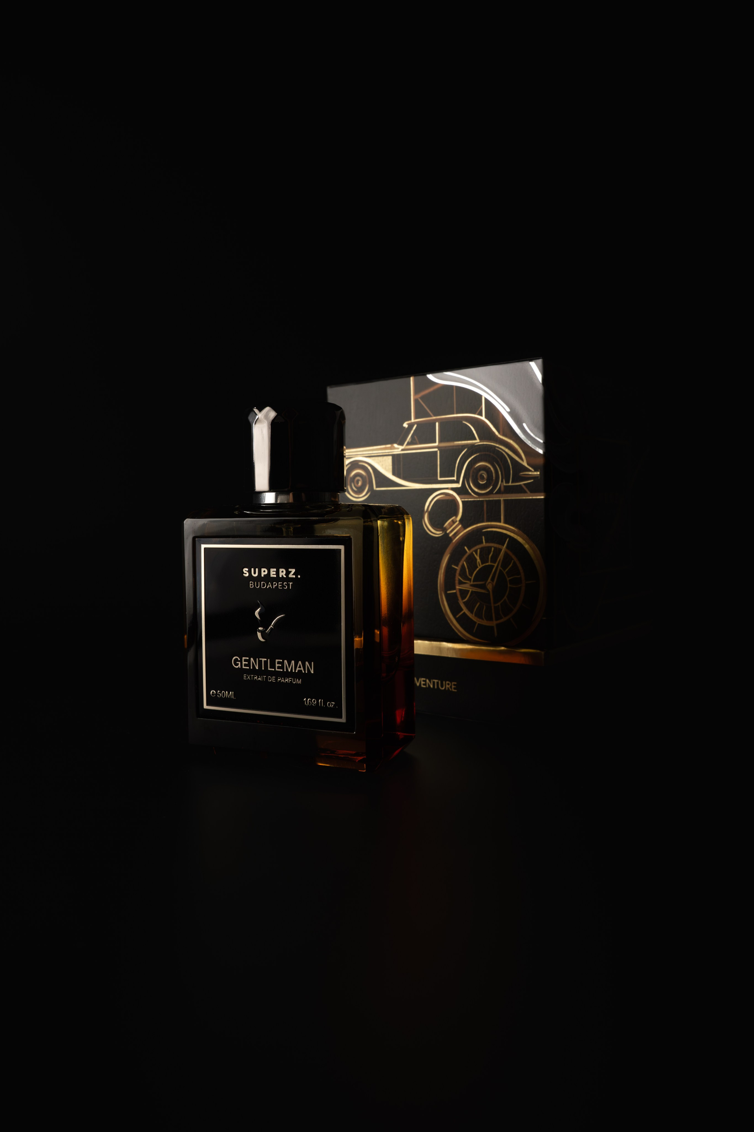 Premium cologne with car motif packaging — dark moody perfume shoot by Jay Soundo.