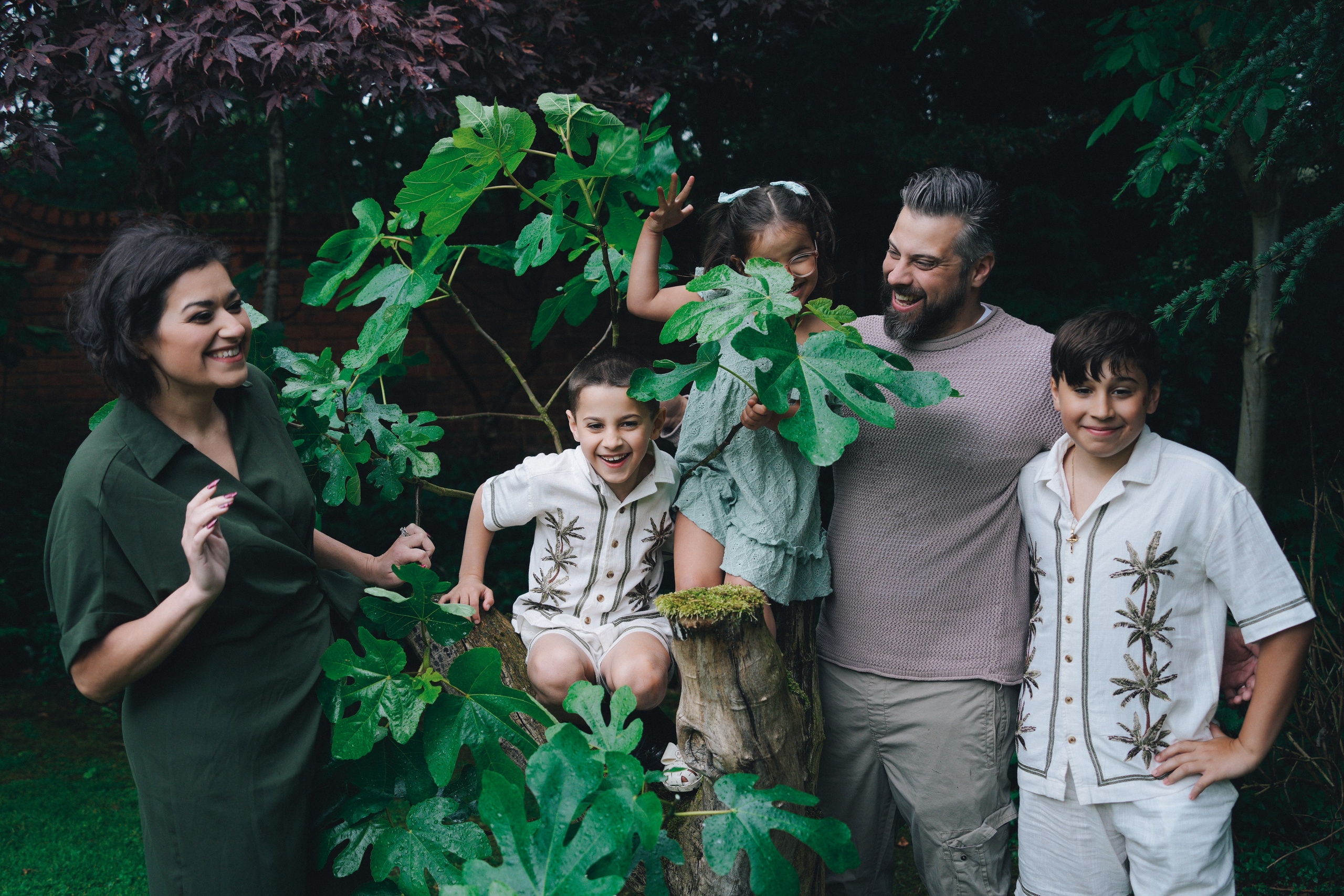 Lifestyle family photographer in Birmingham capturing authentic moments at home.