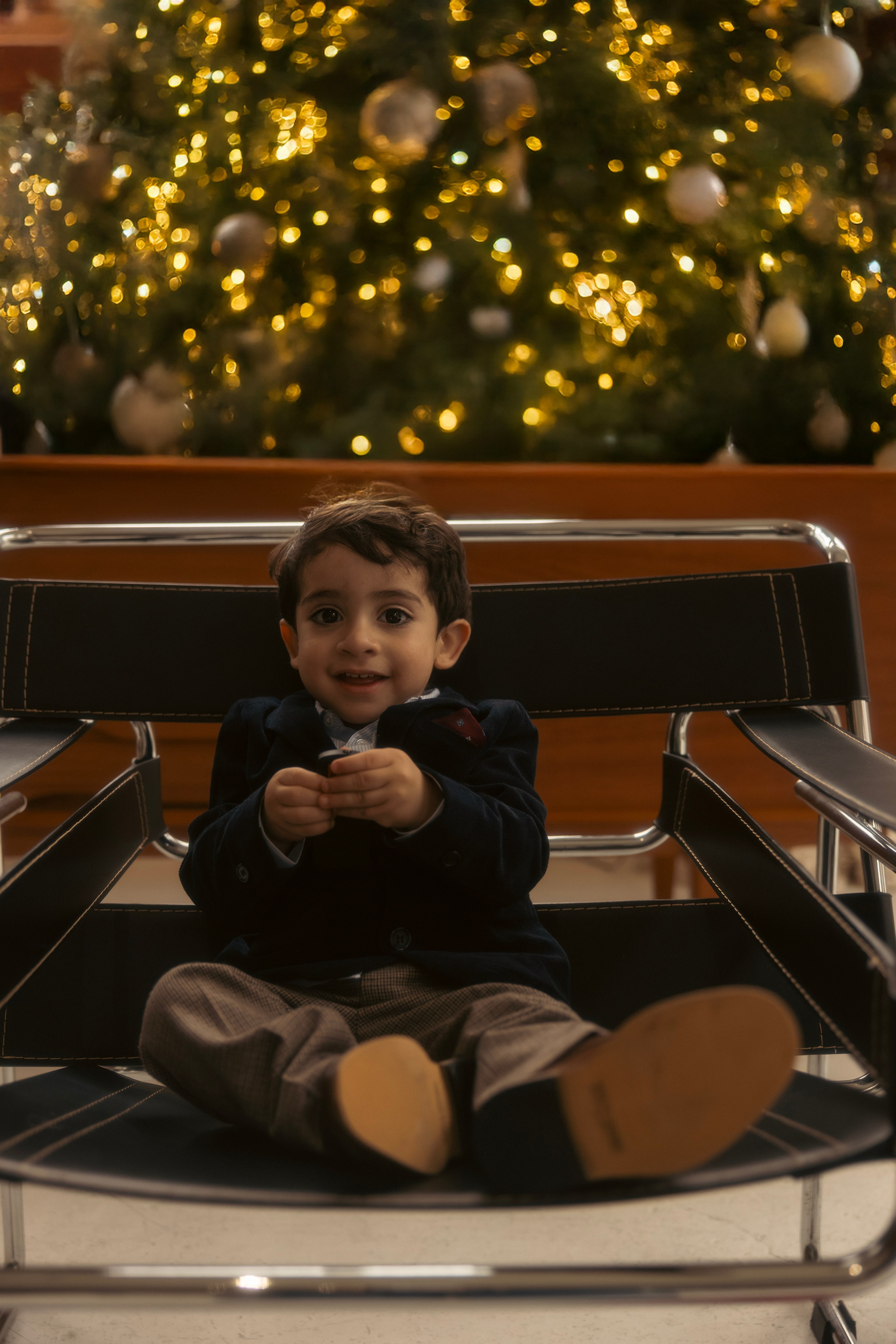 Baby’s first Christmas photoshoot in studio with soft natural light