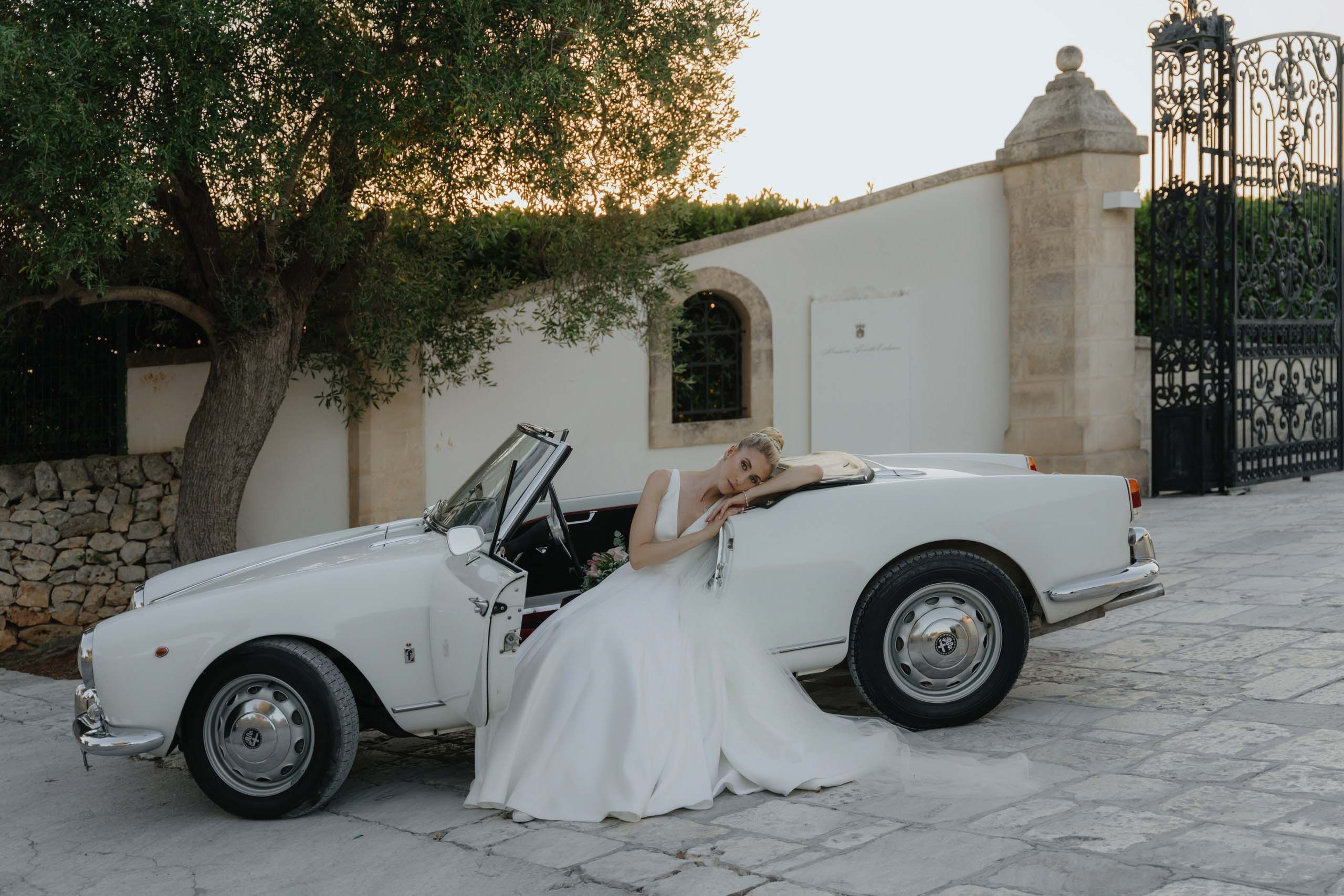 Bride portrait in soft sunset light, elegant luxury destination wedding in Italy