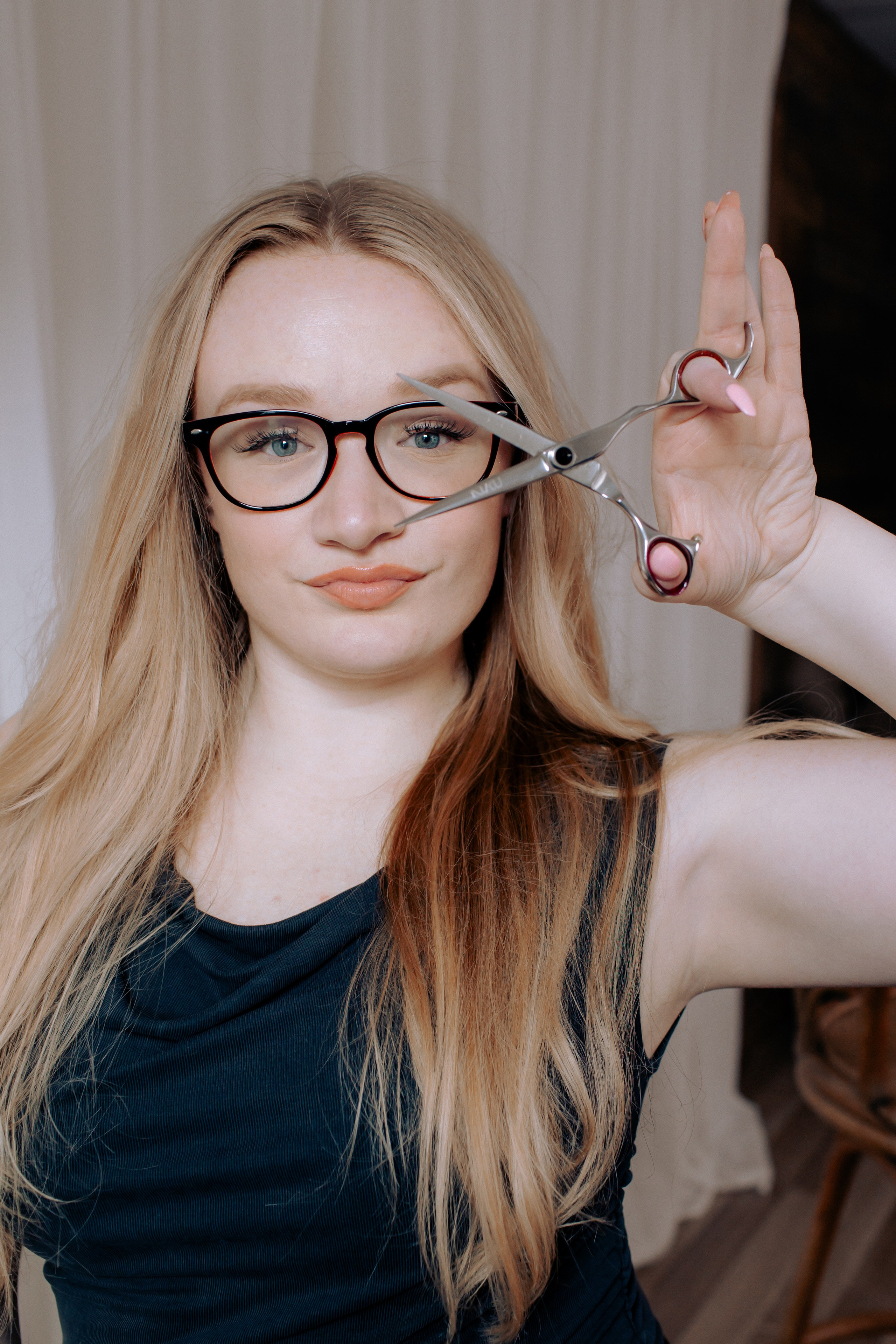 Hair stylist with scissors