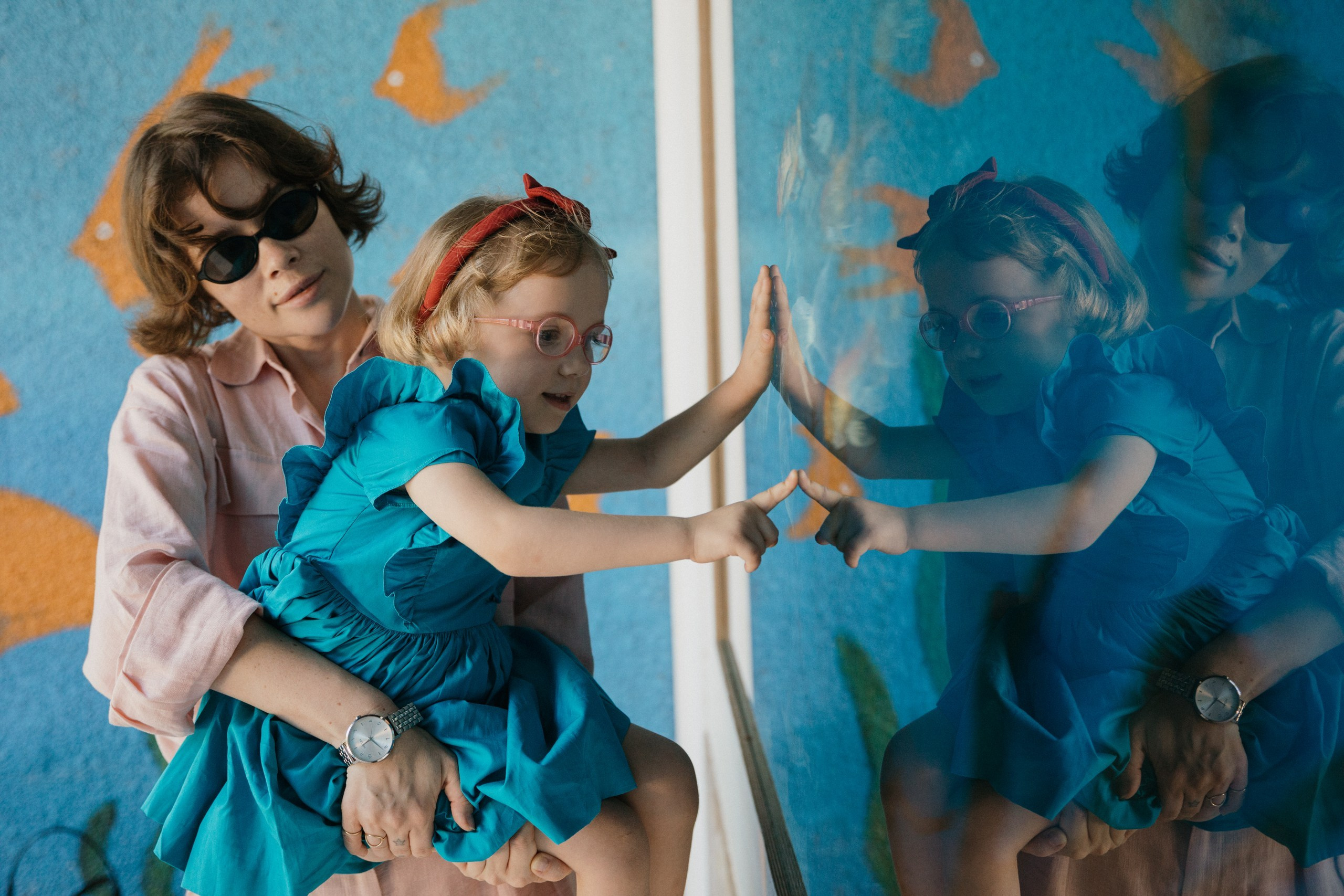 Joyful Moments in Camel park: Olya and Ada’s Day of Fun and Adventure, sliding and riding camels. Photographer in Barcelona capturing unique stories | Kate Chumak