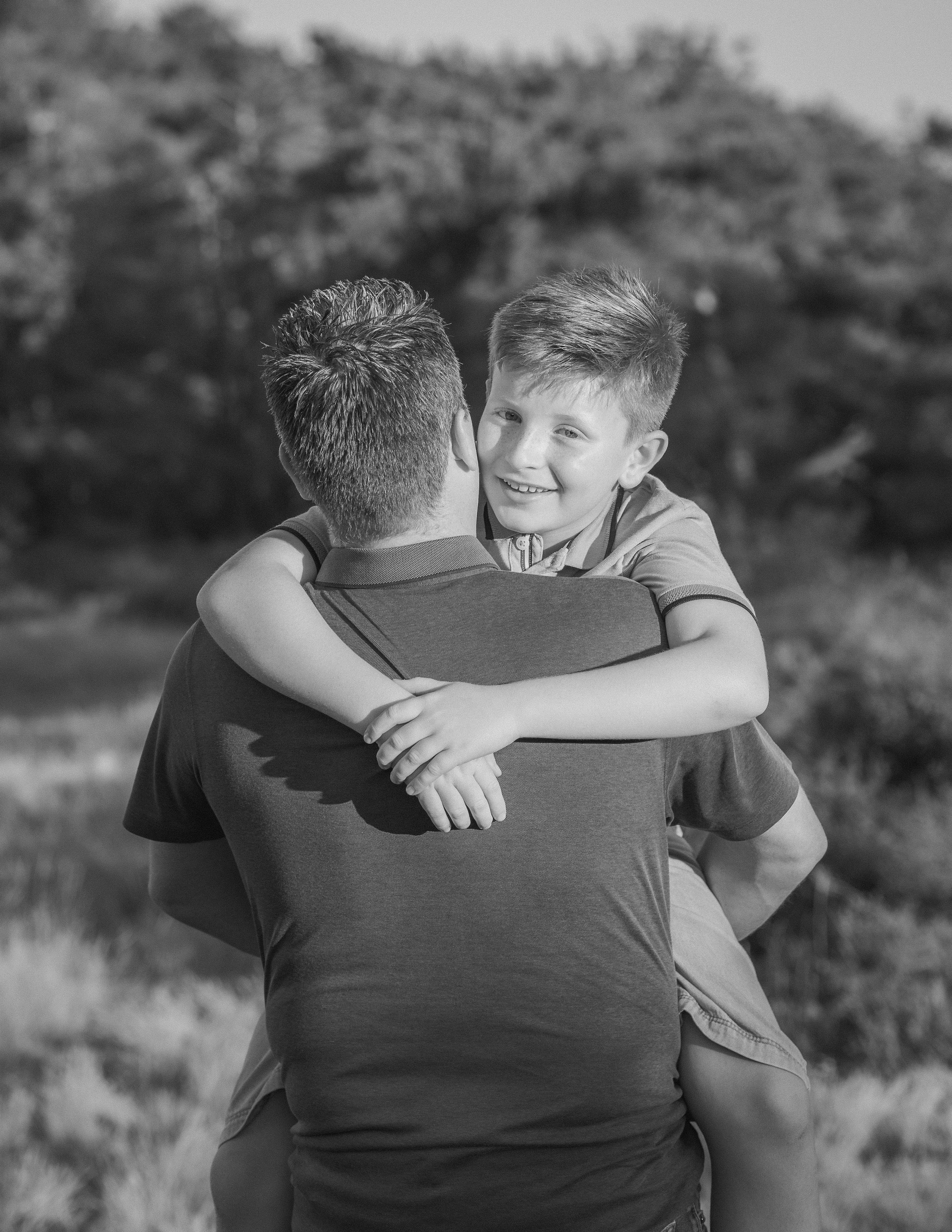 Kapture Fotografie - Professionele portretfotografie van gezin tijdens gezellige familieshoot