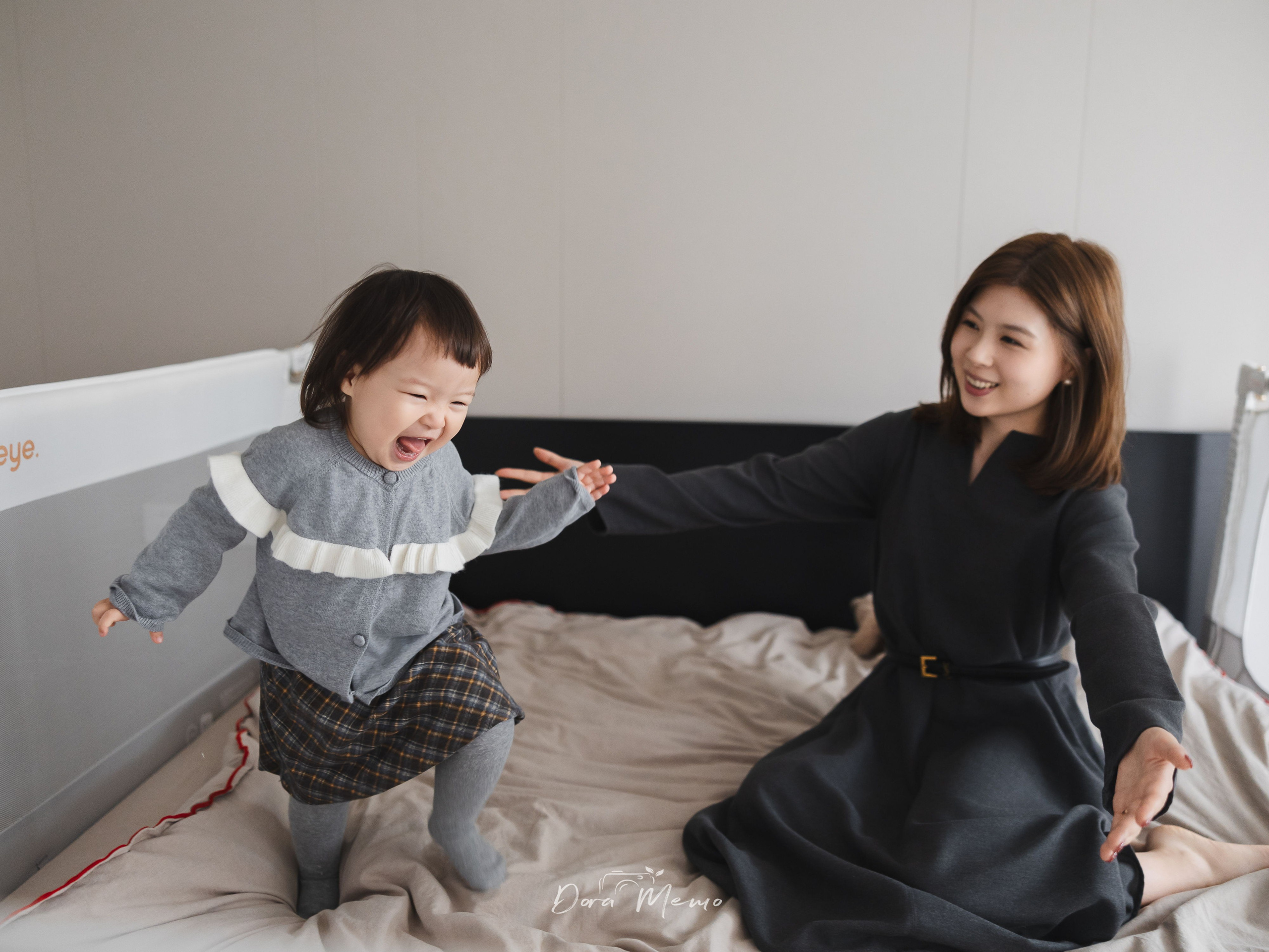 Sweet close-up portrait of a two-year-old girl with a bright expression, natural child photography in Shanghai documenting real emotions.