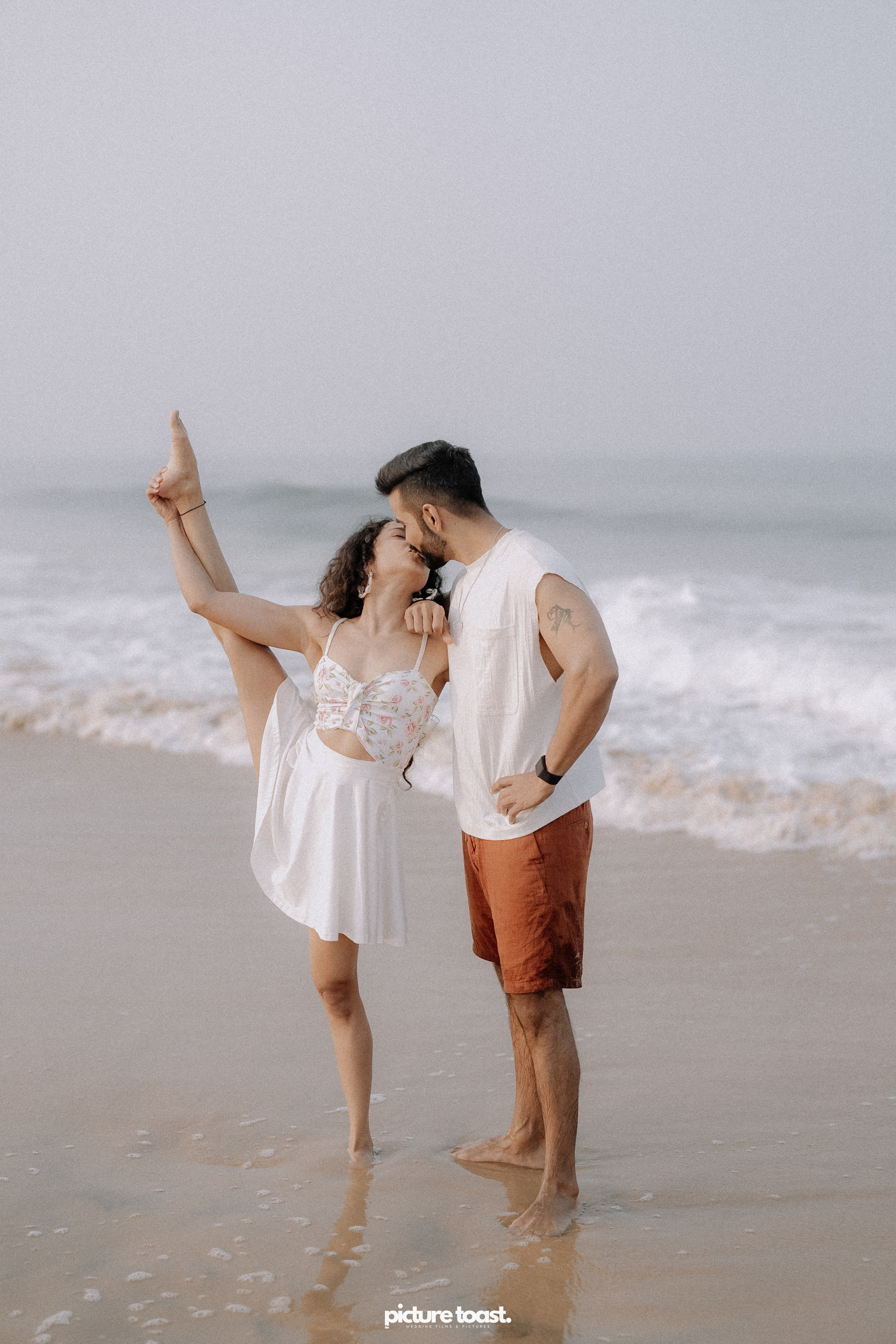 Love In The Beach. Fine art Wedding Photographers in India & Canada