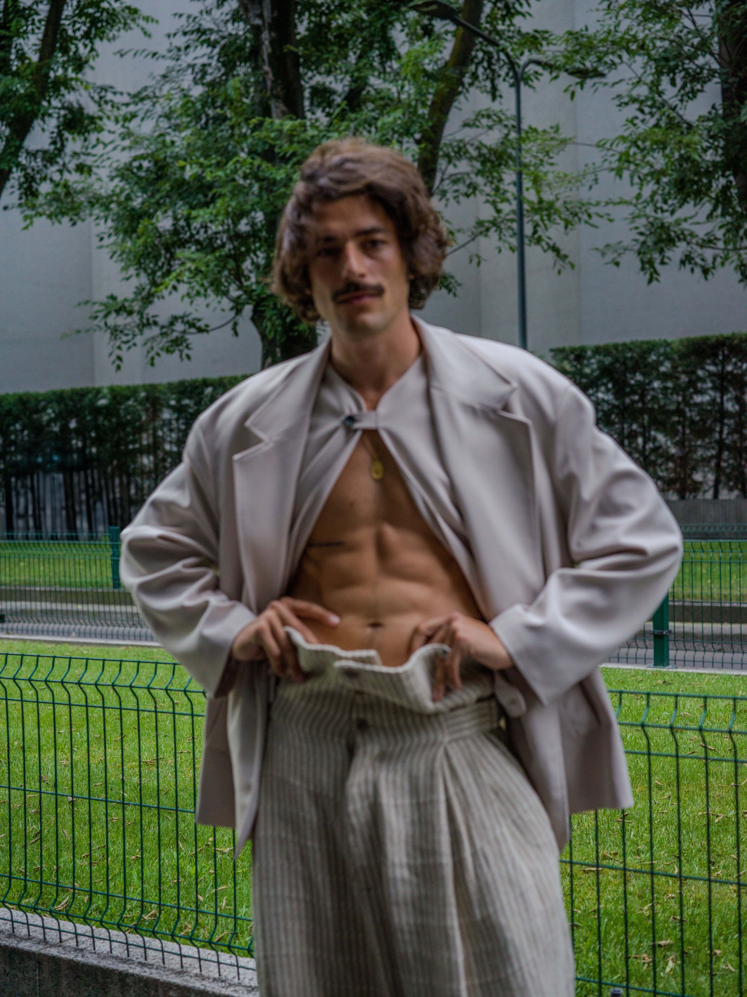 Capturing models on Milan Fashion Week runway. Armani