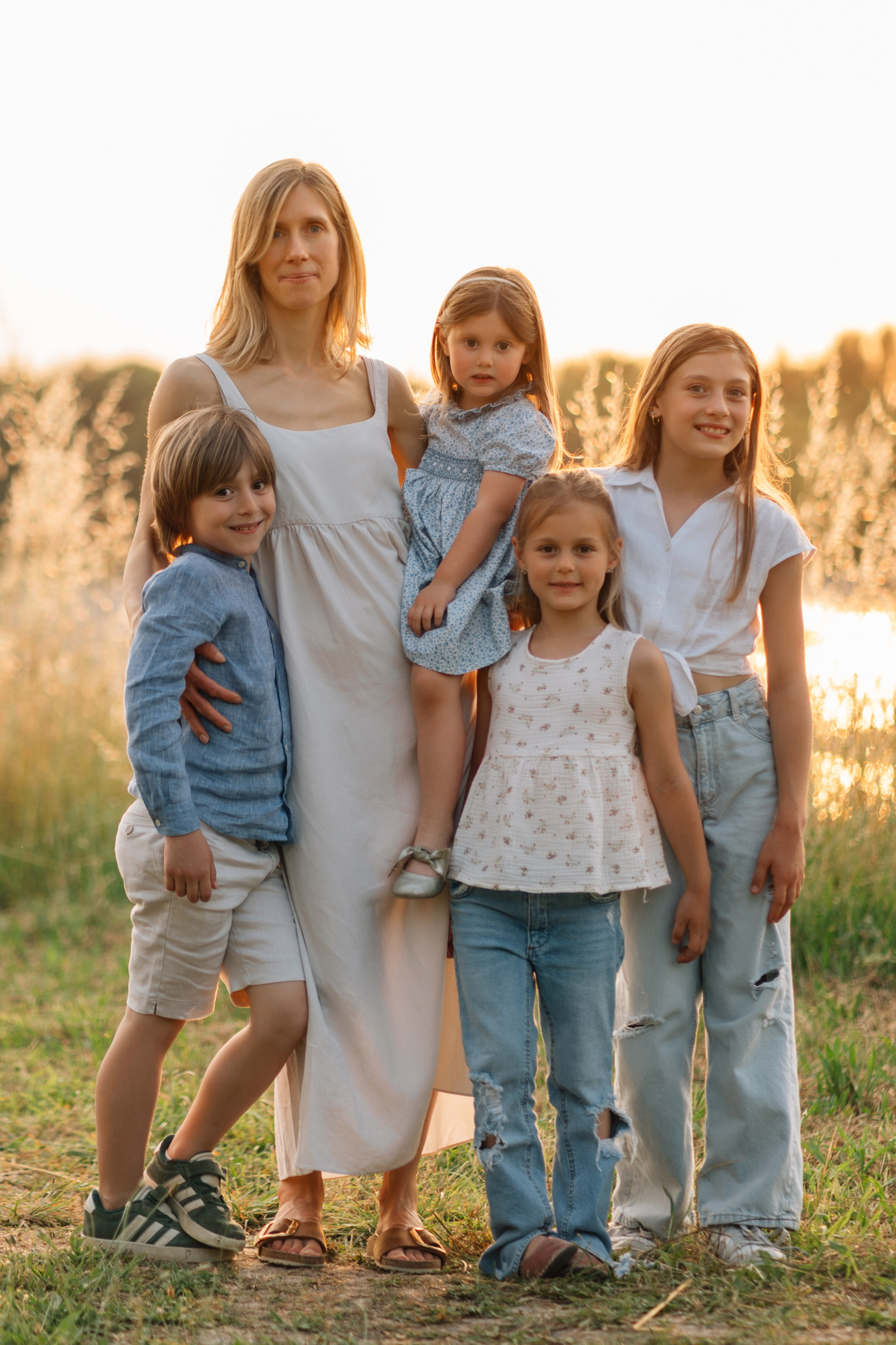 Servizio fotografico di famiglia in un parco a Rimini, Italia. Fotografa di matrimoni e di famiglia in Italia
