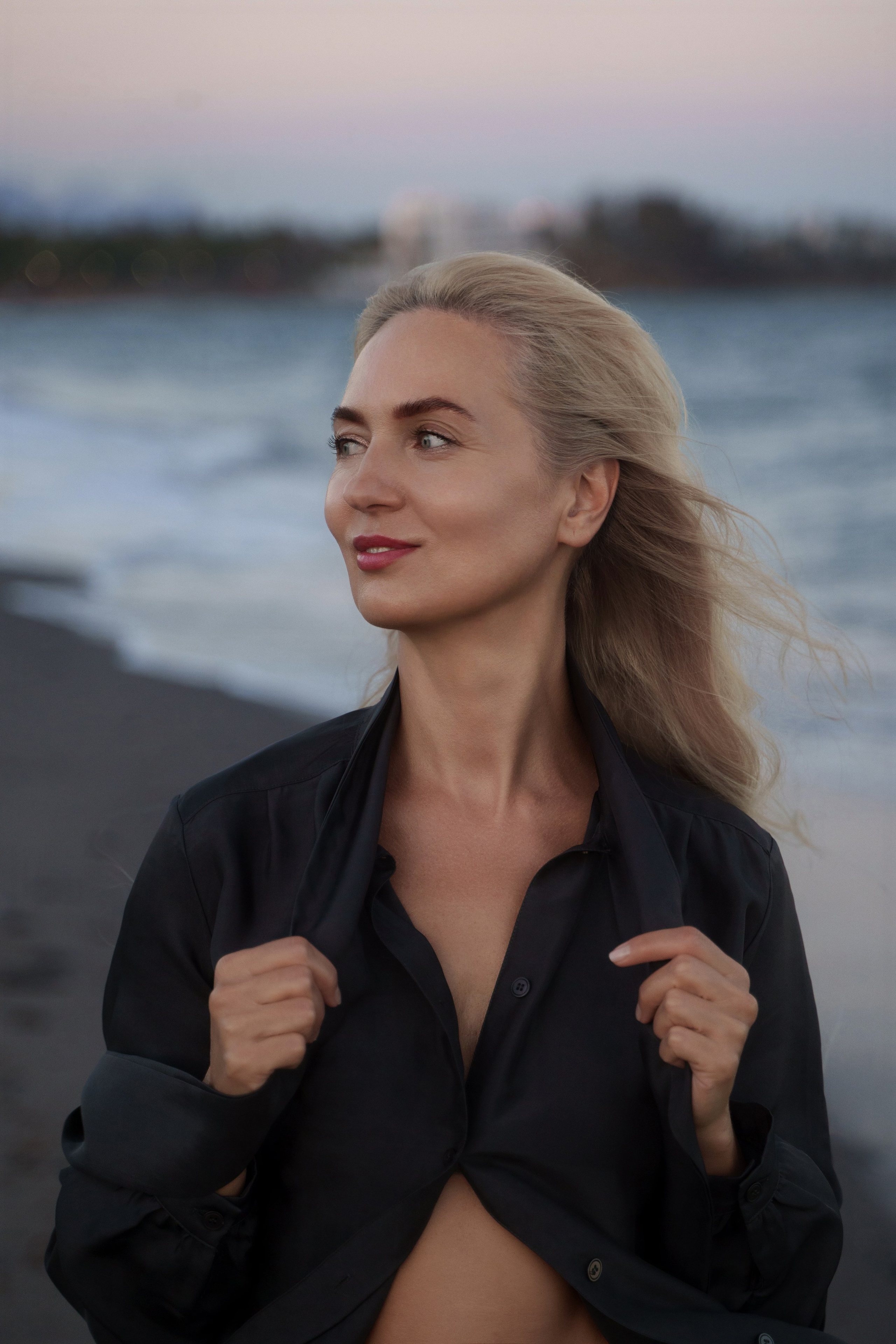 Portrait of a beautiful blonde model enjoying Estepona beach scenery