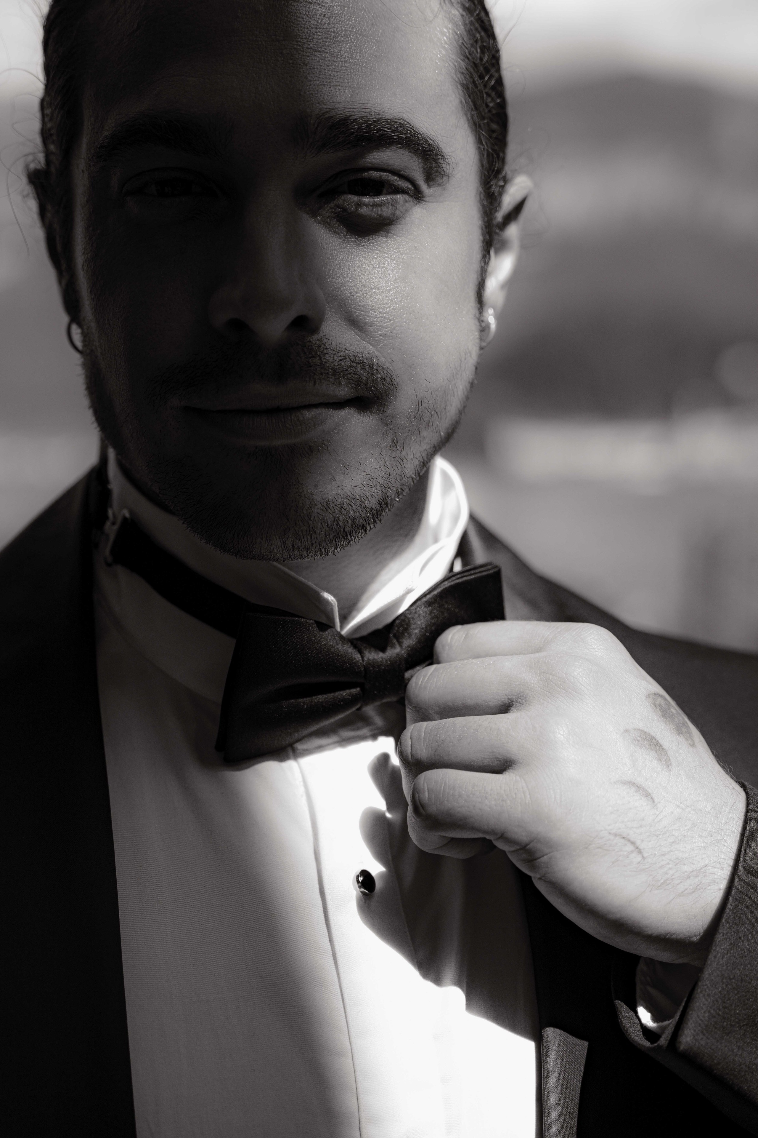    groom portrait black tie Lake Como elopement Italy