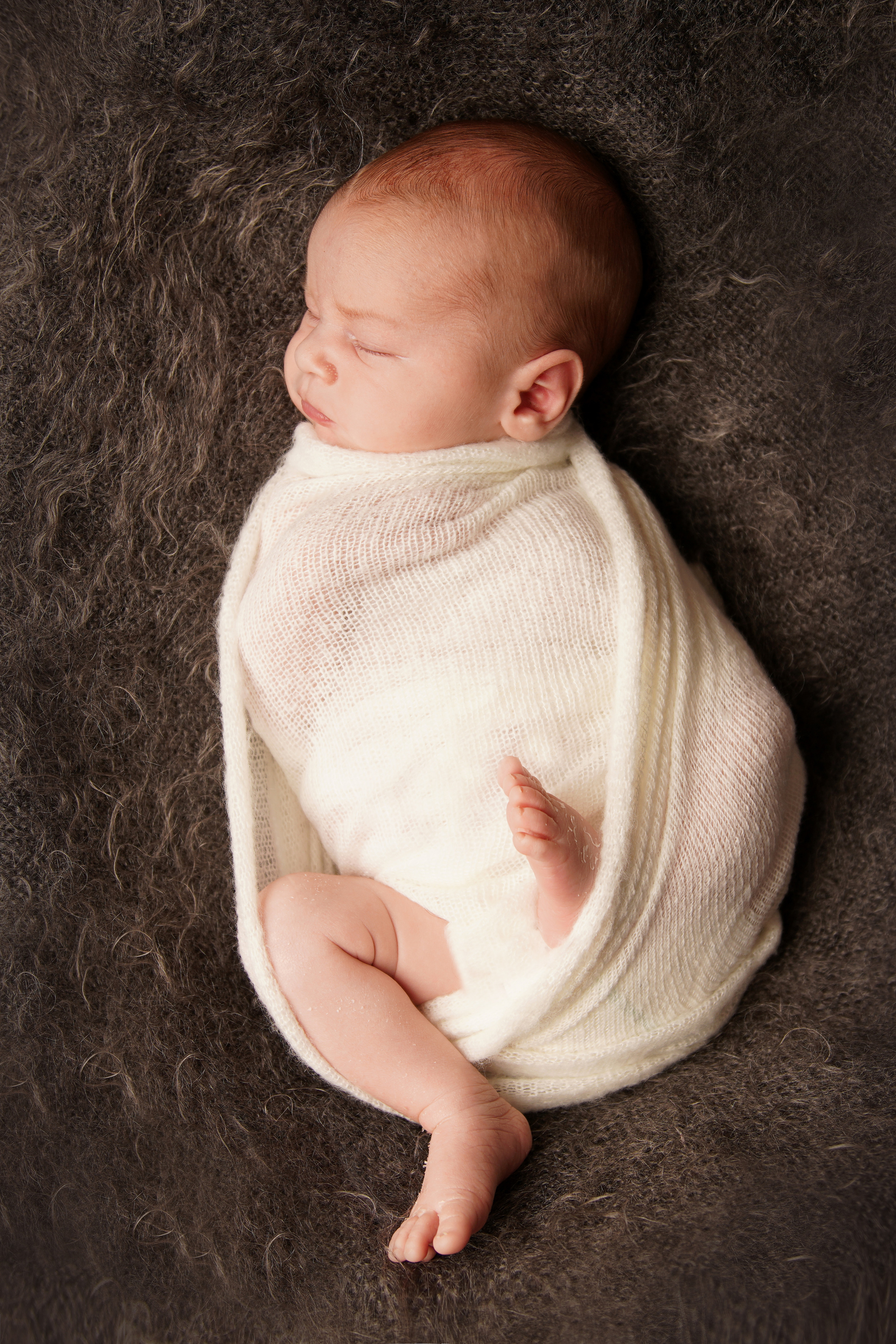 Fotoshooting in warmen Pastellfarben. Neugeborenenfotografin und Retoucher in Augsburg Nastassia Schneider