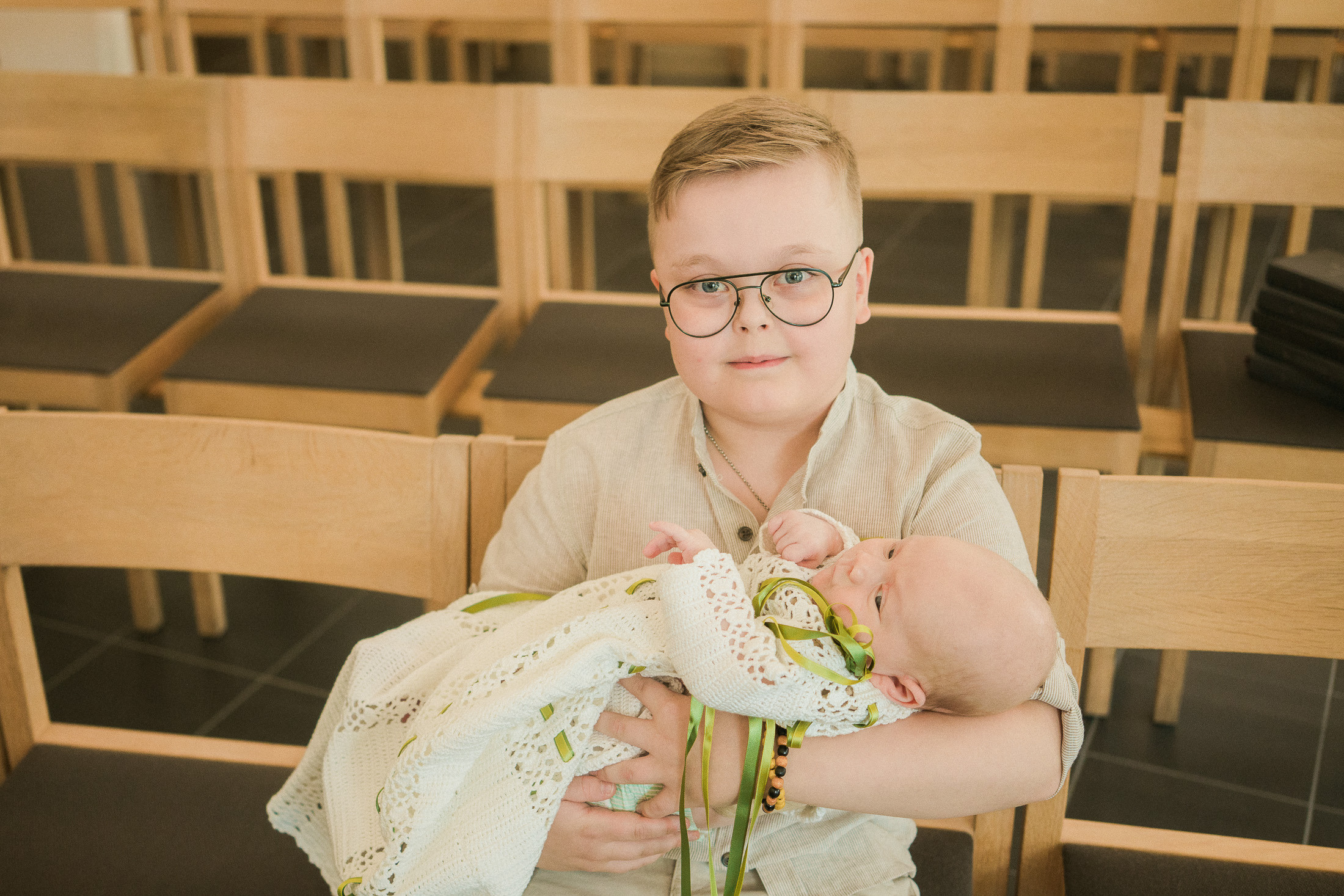 Ristiäisten kuvaus Helsingin Pitäjämäen kirkossa