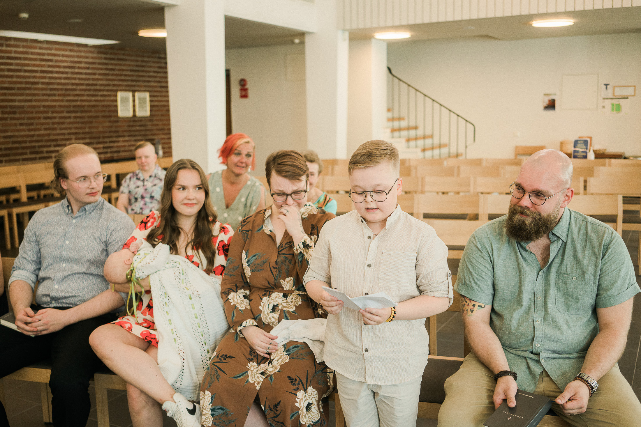 Ristiäisten kuvaus Helsingin Pitäjämäen kirkossa