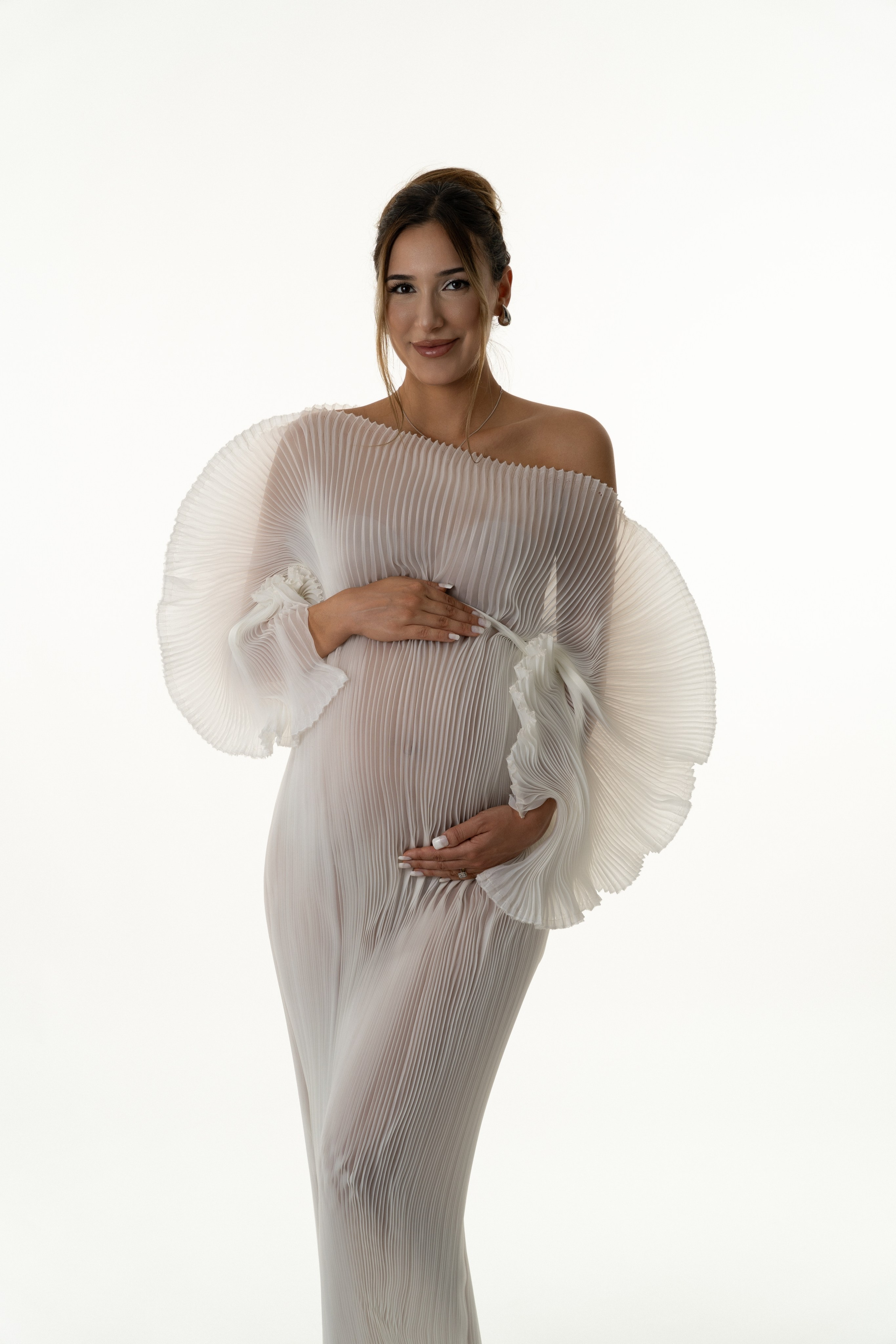 Babybauch Fotoshooting. Anna, Fotografin aus Wien, Österreich. Ich fotografiere in folgenden Genres: Babybauch-, Familien-, Mode- und Weihnachtsfotografie