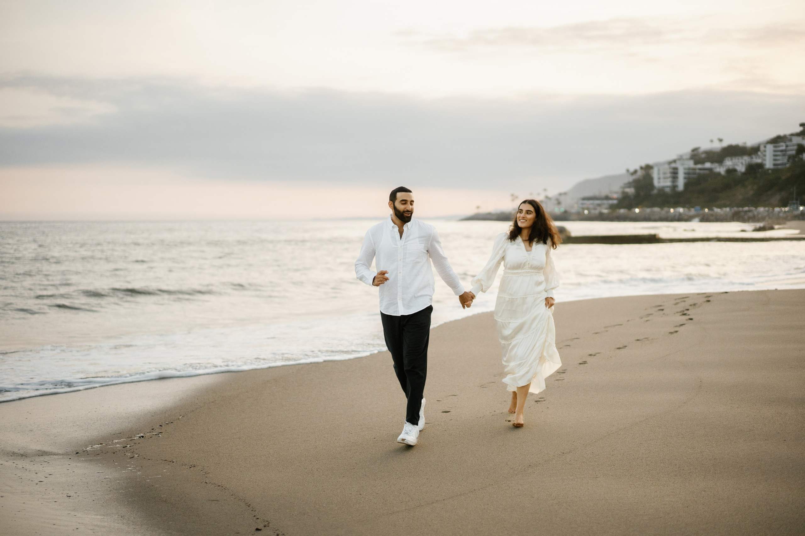 Santa Monica Sunset Engagement Photoshoot. Wedding Photography & Videography Team in California, Los Angeles, San Francisco, San Diego and Travel