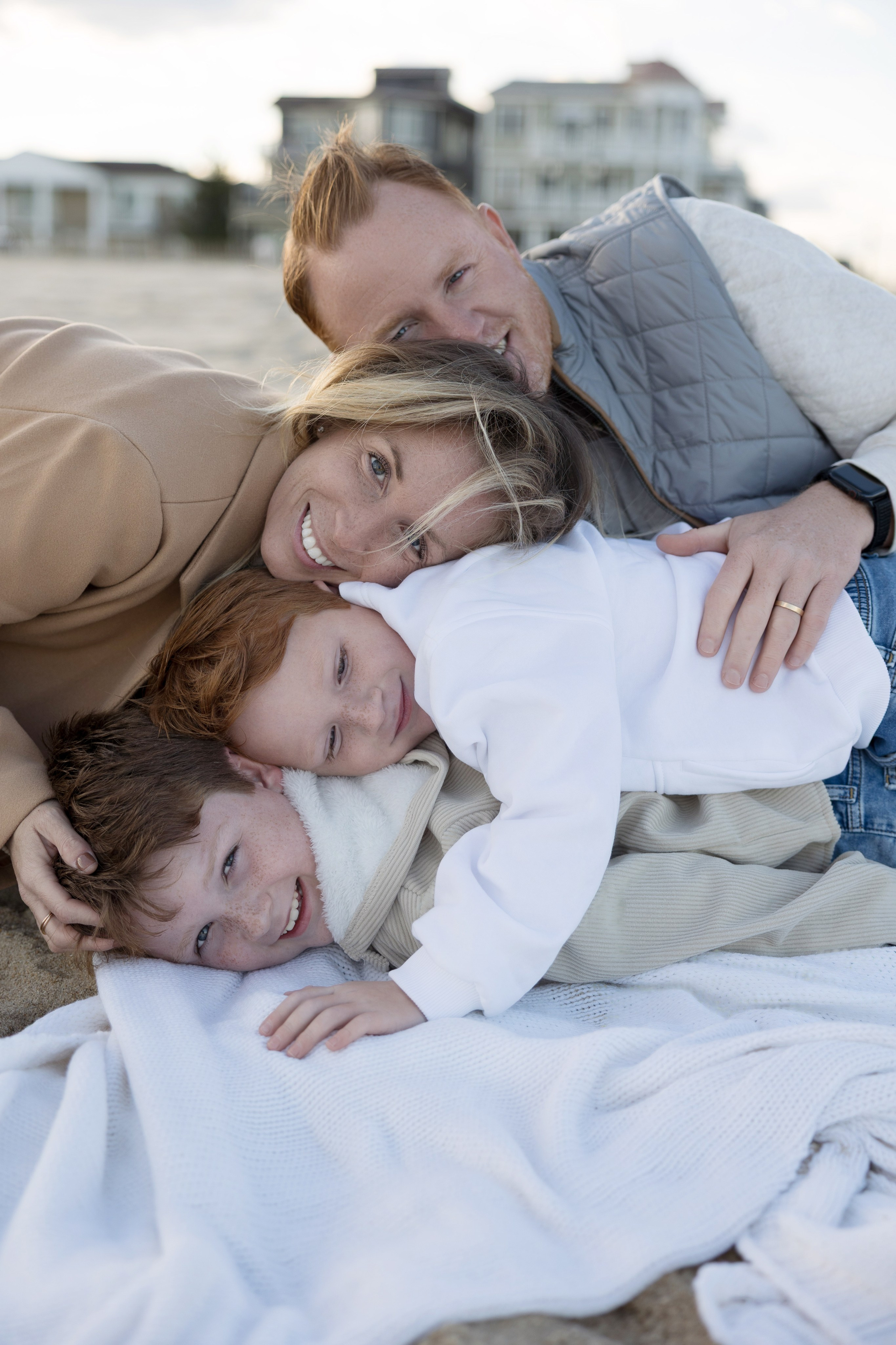 Sun, Sand, and Family Hugs. Family, lifestyle, and commercial photography in New York and New Jersey