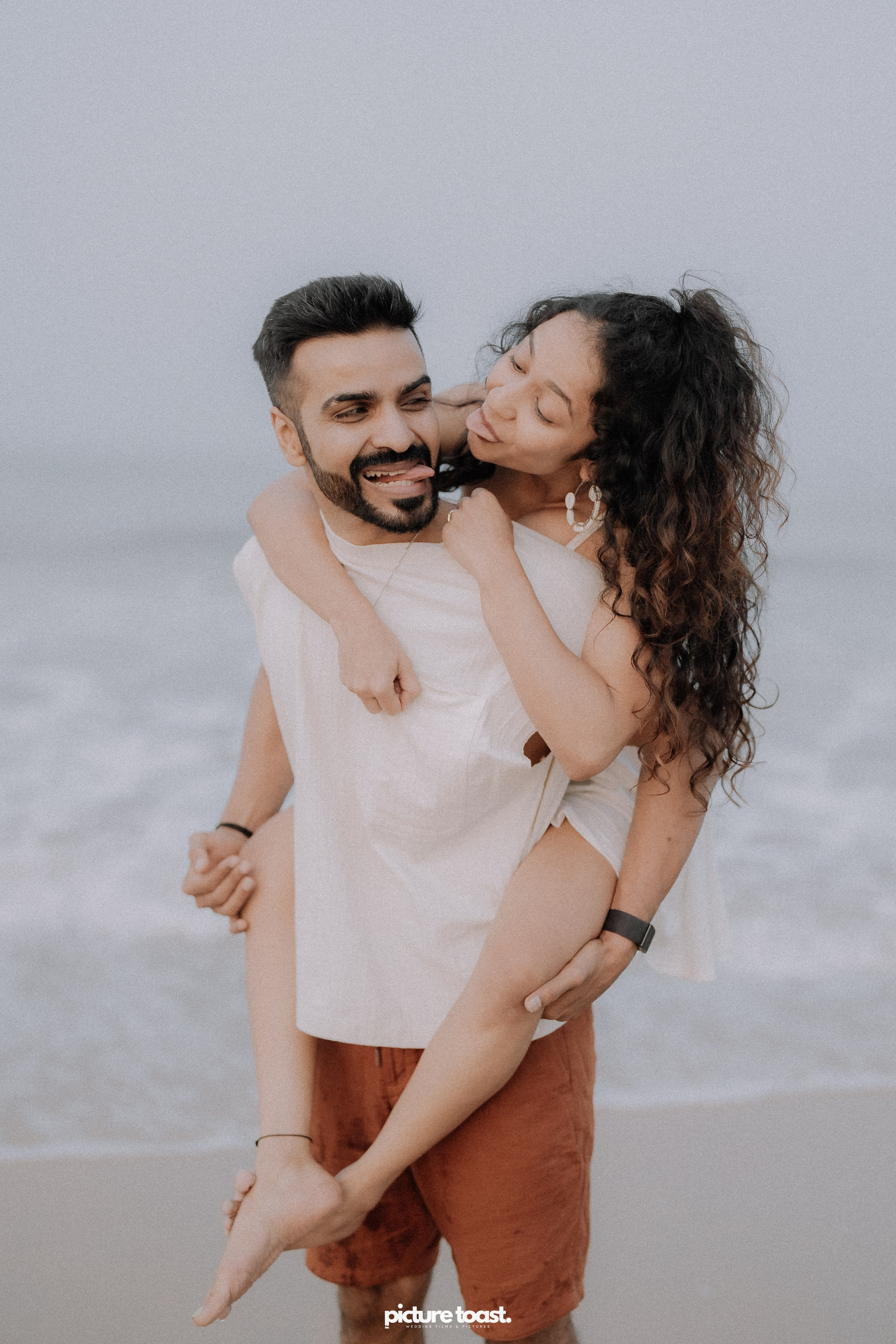 Love In The Beach. Fine art Wedding Photographers in India & Canada