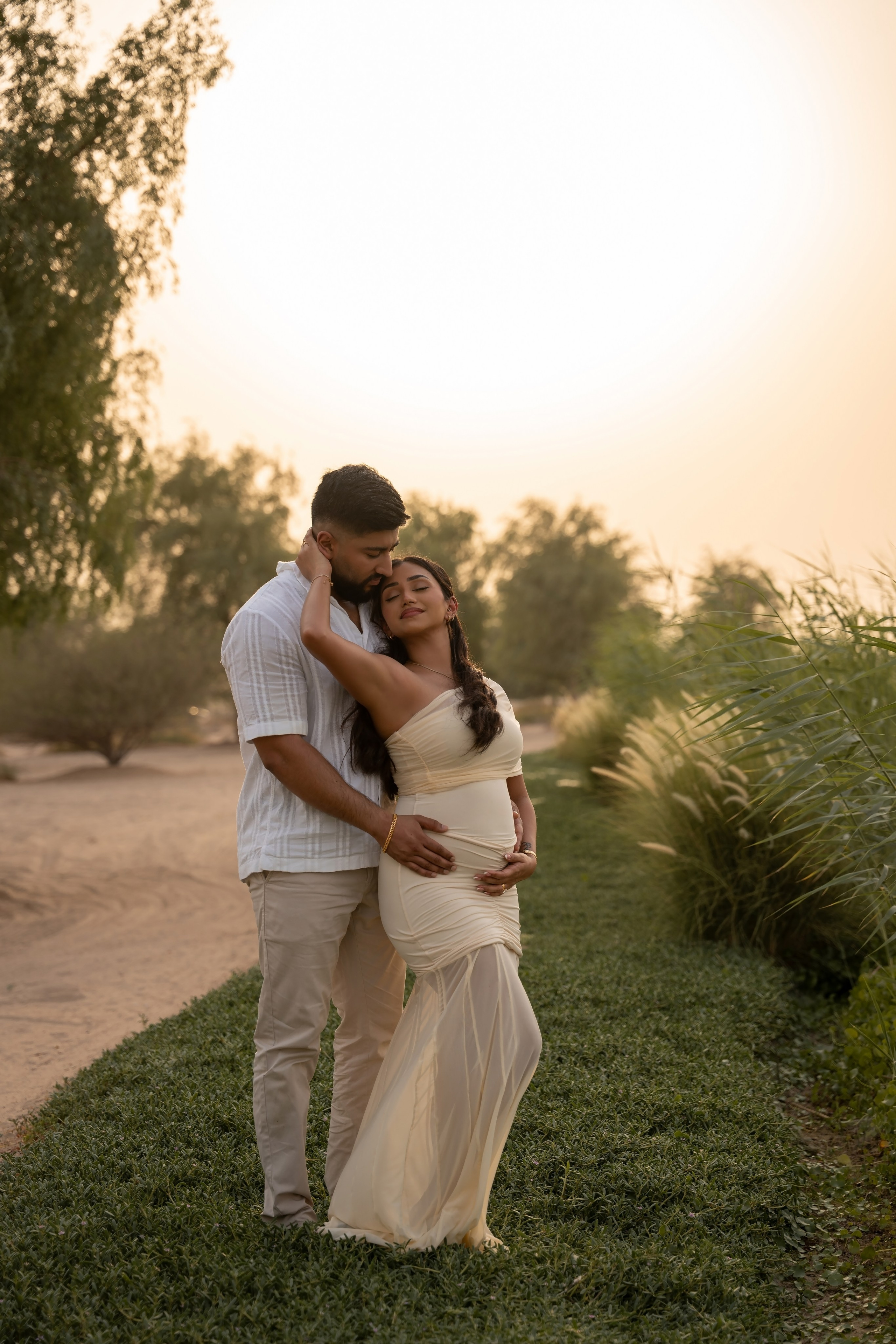 Sunset whispers: Boy or Girl?. Angela Iakovleva — Family Photographer in Dubai