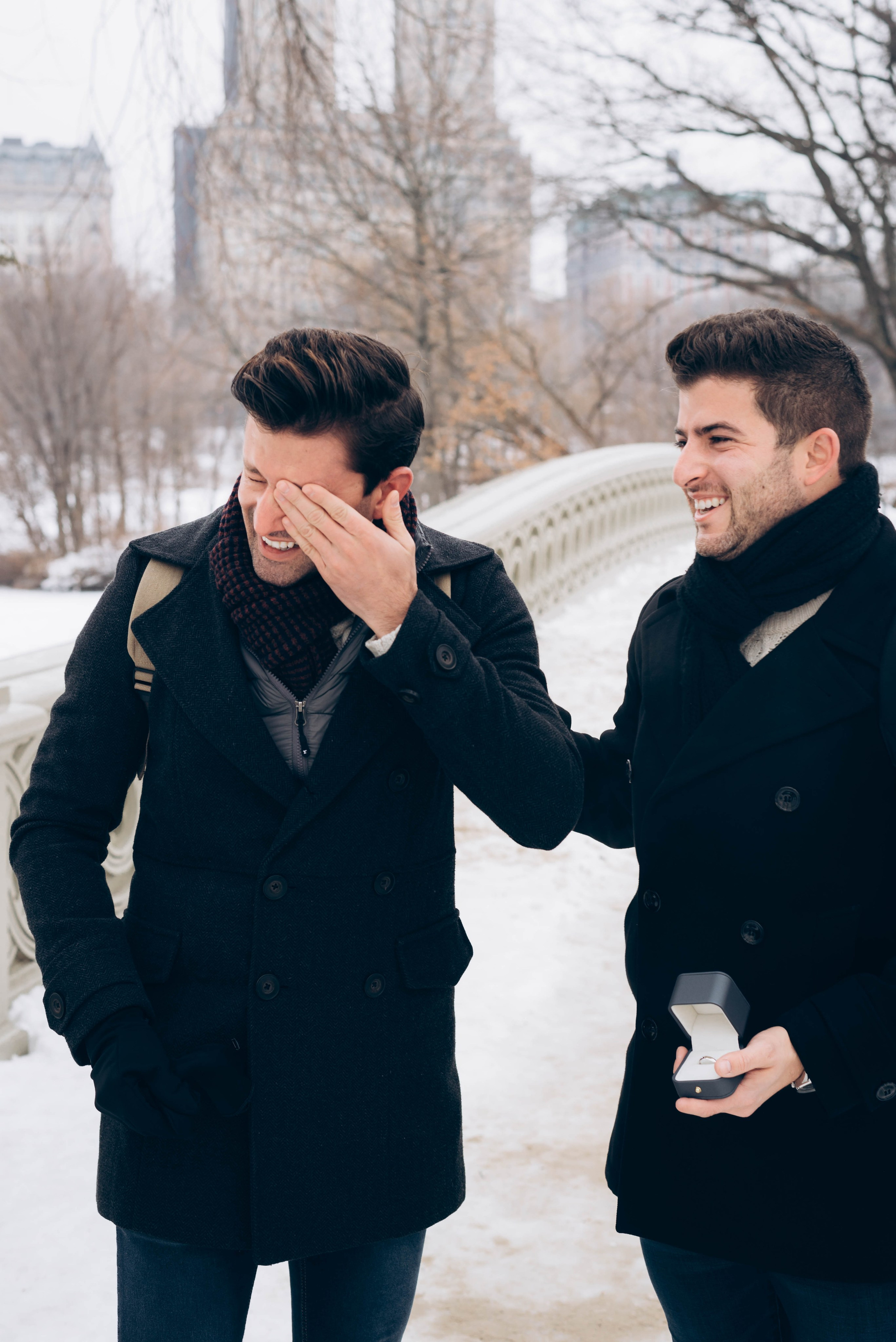 Bride-to-be smiling with ring near Bethesda Terrace.