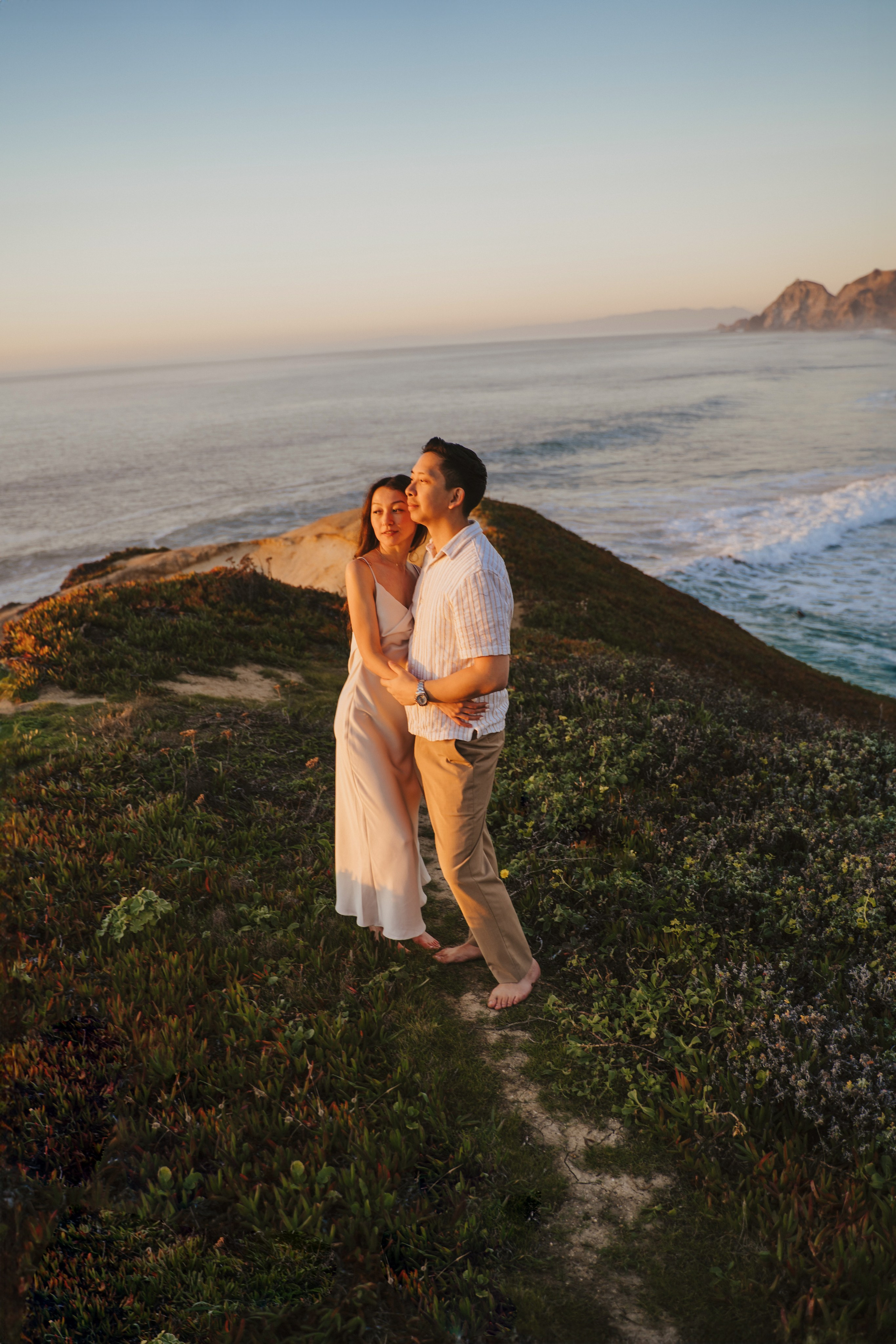 A photo shoot on the San Francisco beach at sunset. Engagement session. 