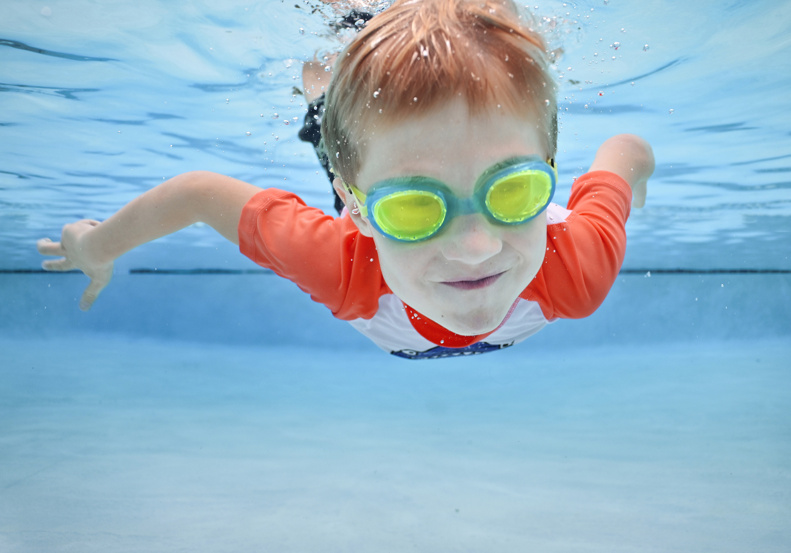 Olga and family underwater session. Family and Sports photographer in Cary Raleigh NC North Carolina