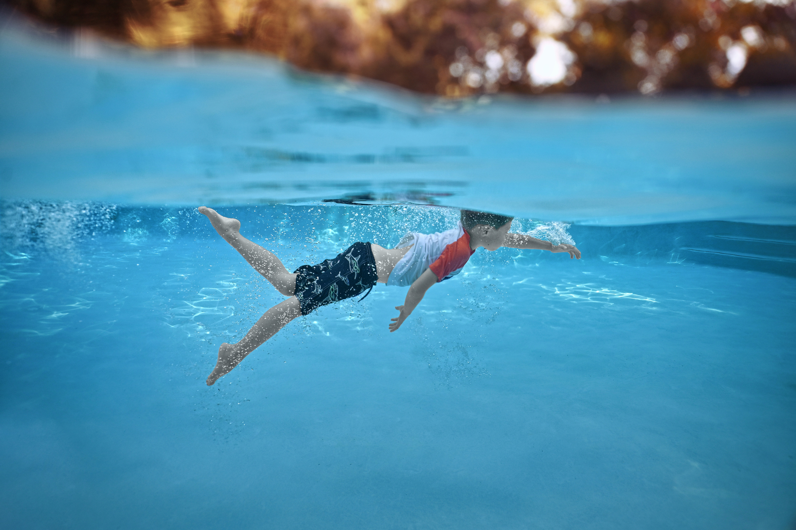 Olga and family underwater session. Family and Sports photographer in Cary Raleigh NC North Carolina