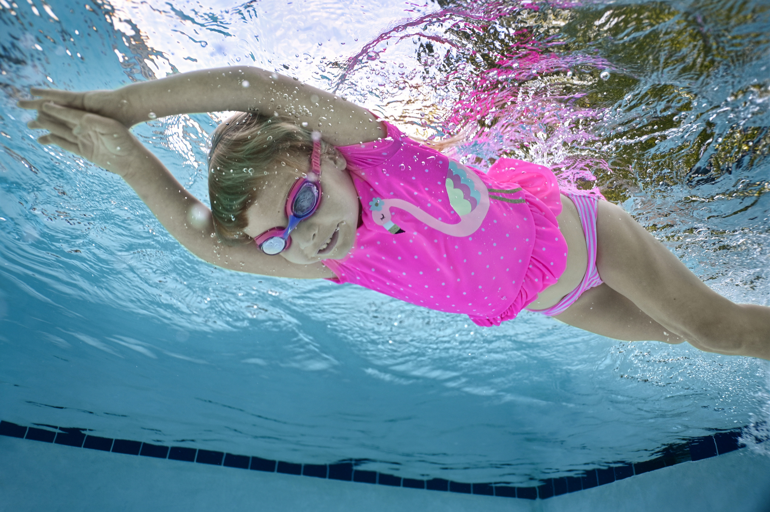 Olga and family underwater session. Family and Sports photographer in Cary Raleigh NC North Carolina
