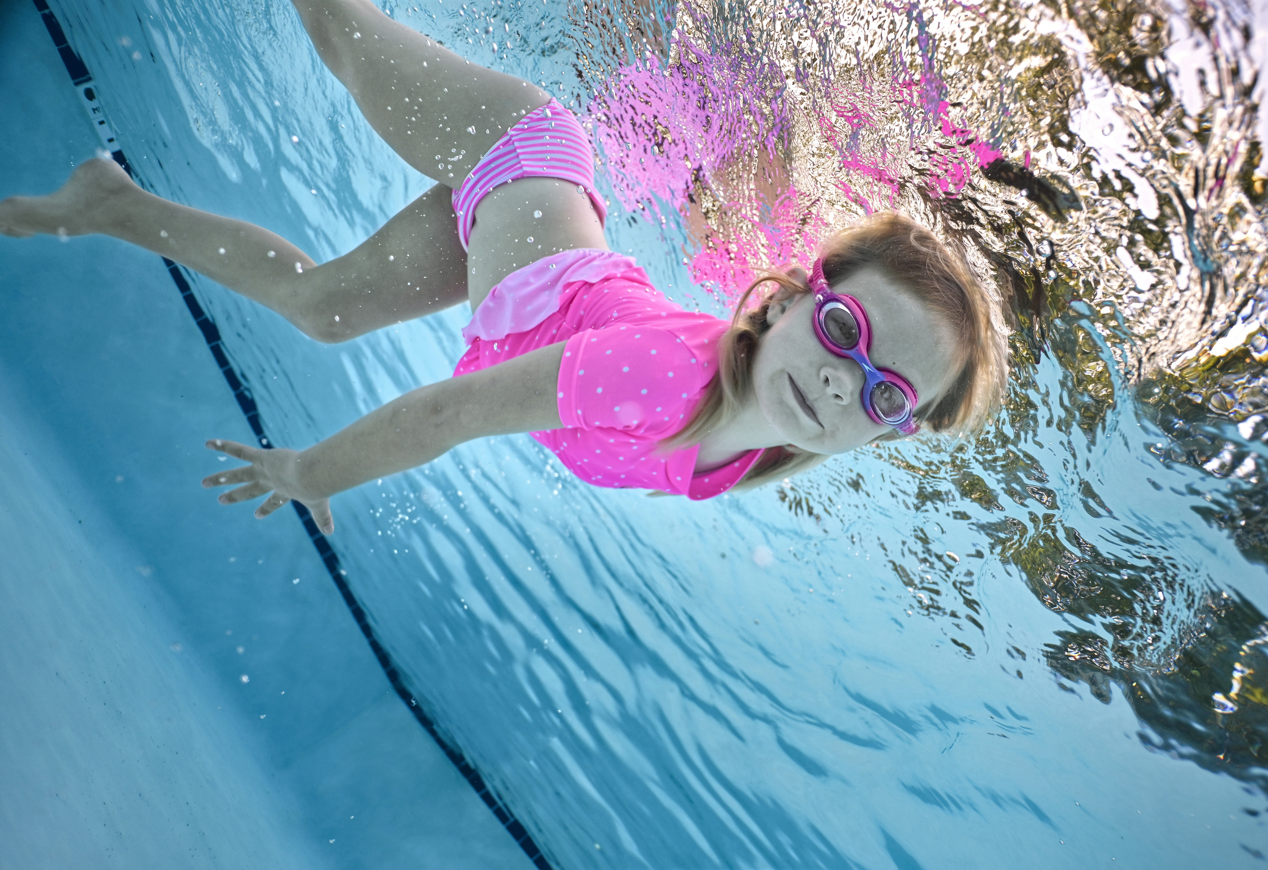 Olga and family underwater session. Family and Sports photographer in Cary Raleigh NC North Carolina