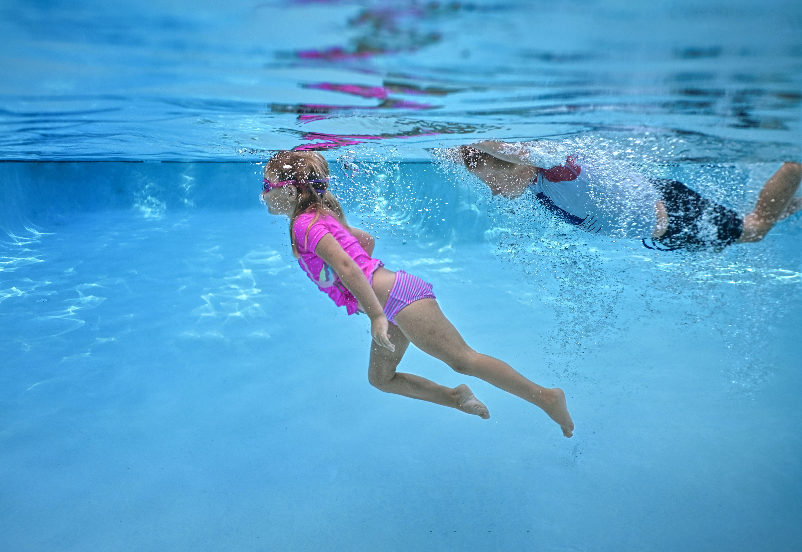 Olga and family underwater session. Family and Sports photographer in Cary Raleigh NC North Carolina