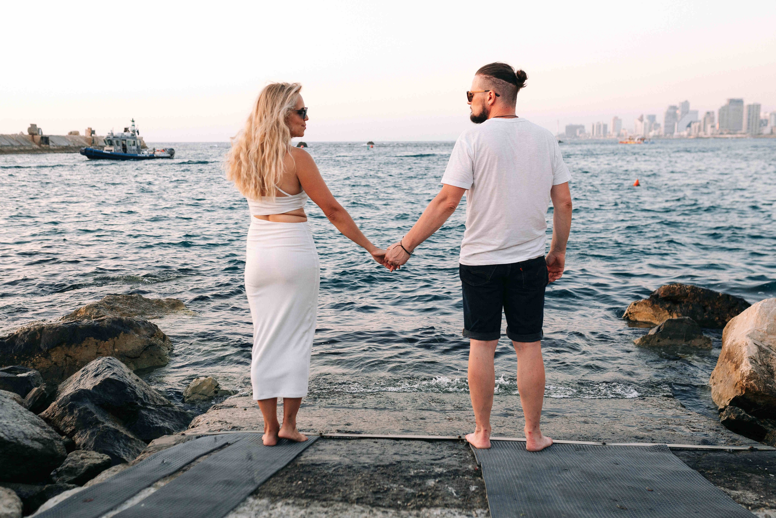 SUNSET IN JAFFO PORT. PHOTOGRAPHER IN ISRAEL