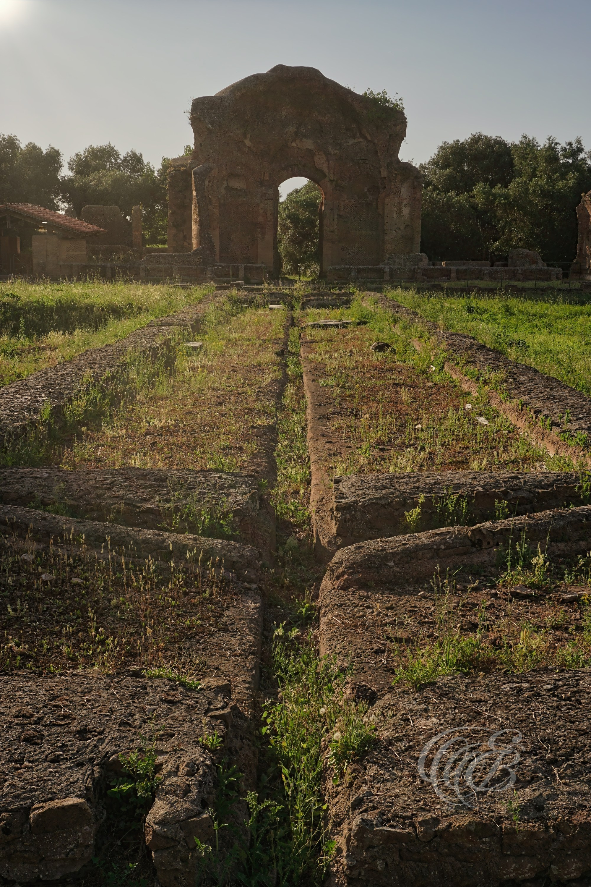 This view reveals part of the underground channel system beneath the Golden Square (Piazza d'Oro). While their exact function may have varied throughout the complex, channels such as these formed part of the sophisticated infrastructure that supplied and managed water across Hadrian's Villa, reflecting the advanced engineering of the Roman world.
