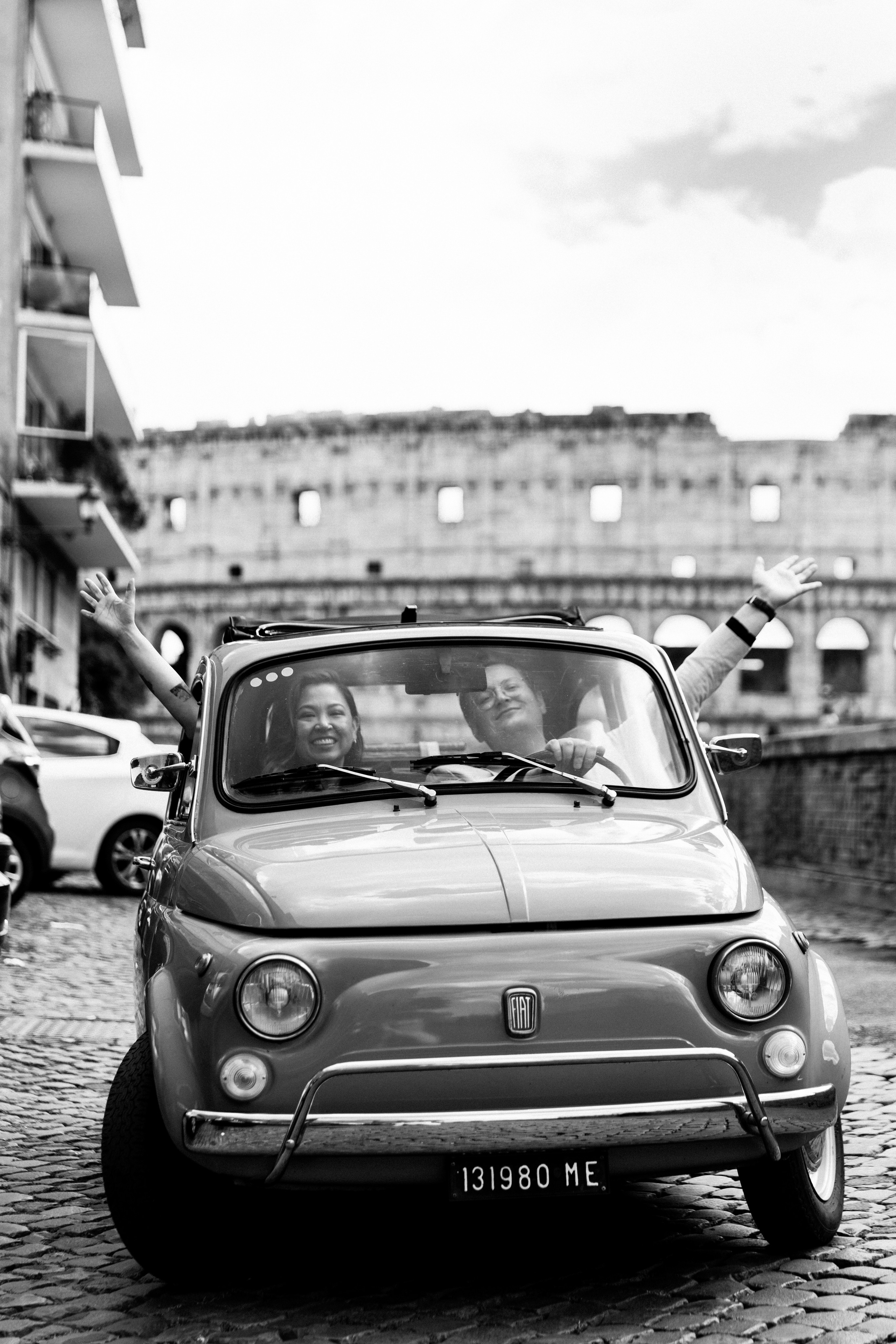 Fiat 500 and Vespa. Photographer in Rome