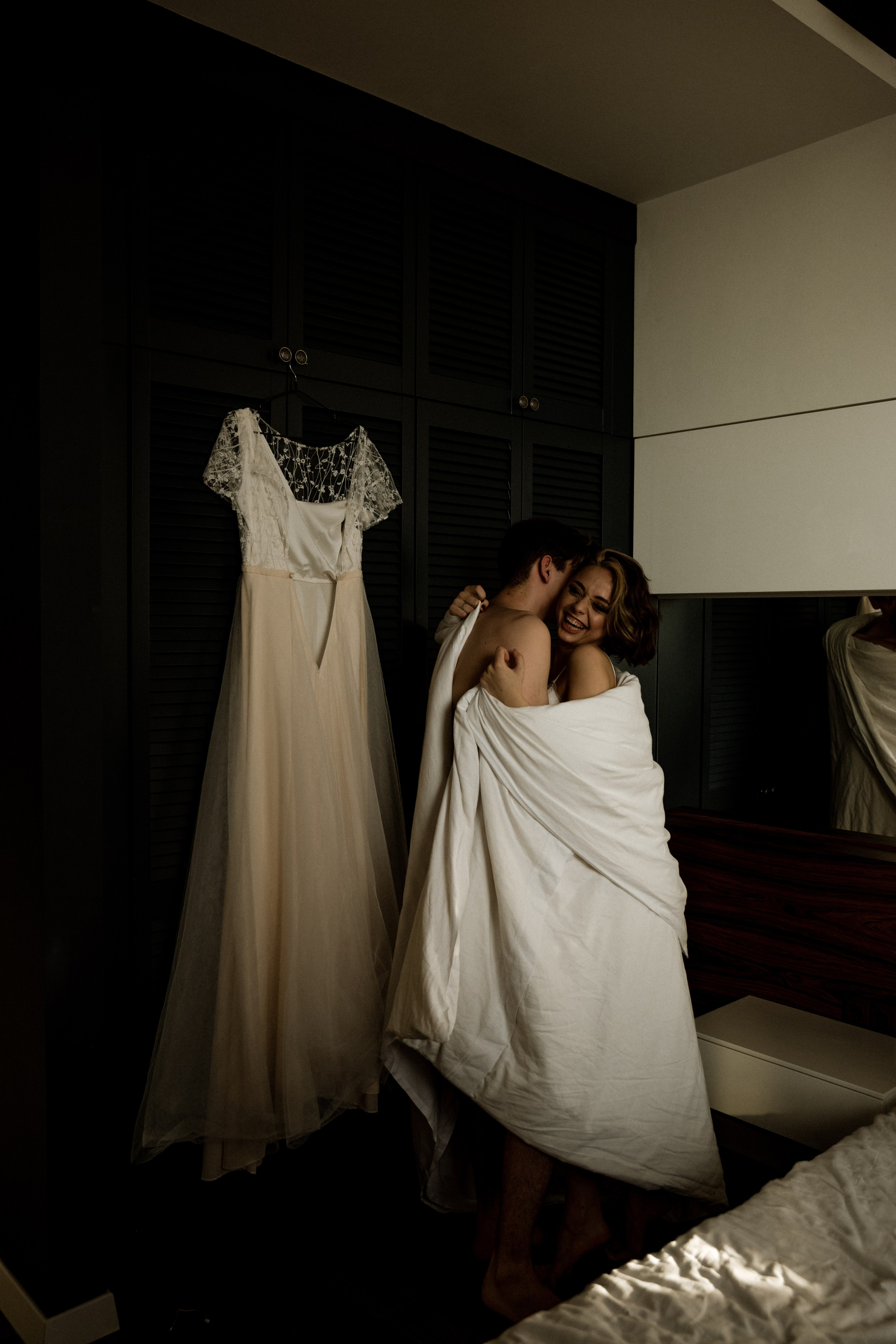 Romantic boudoir bridal portrait near seaside window, wedding photographer France