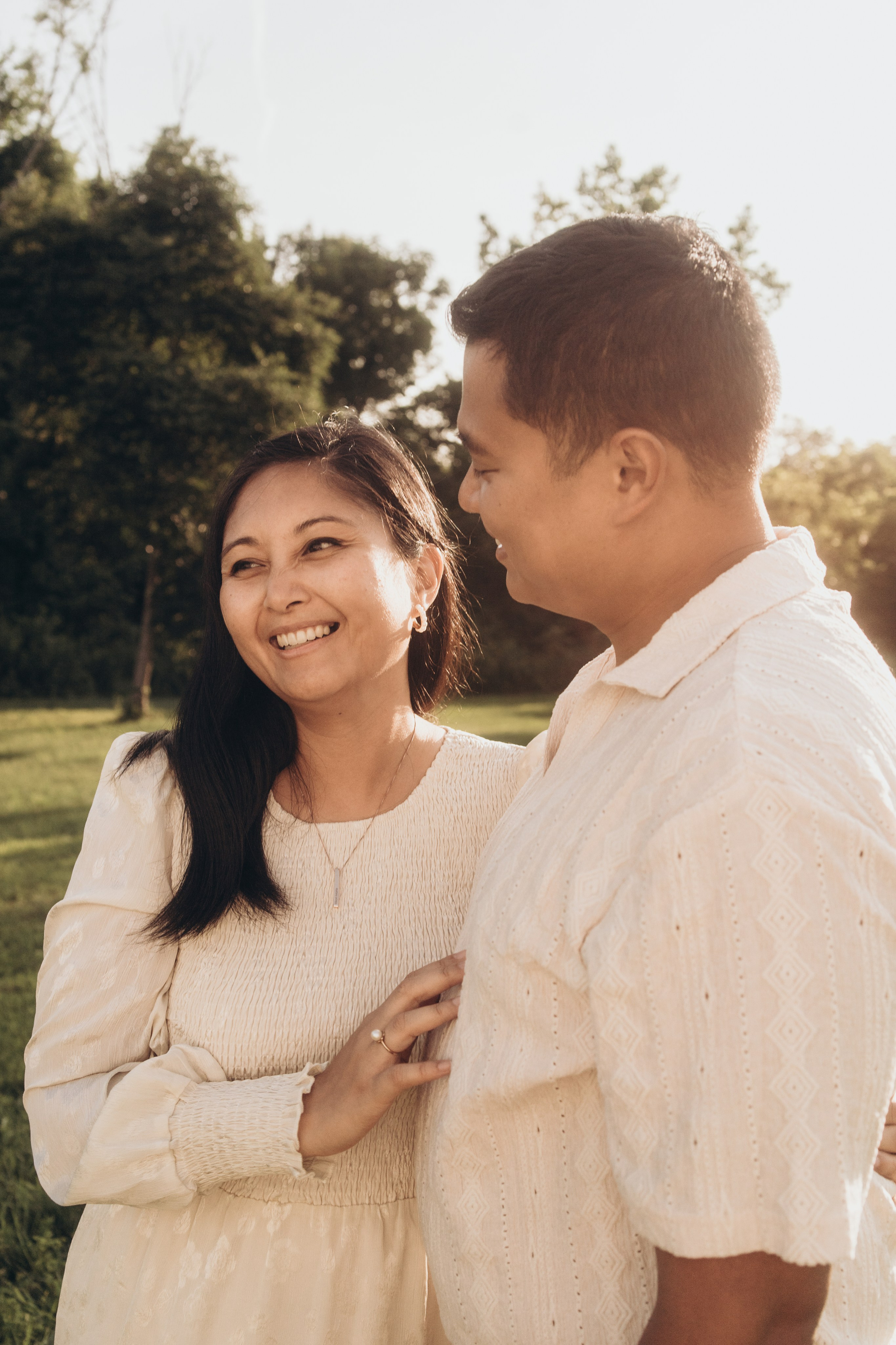 Mother and father smiling together in the backyard, East Haddam Connecticut family photographer