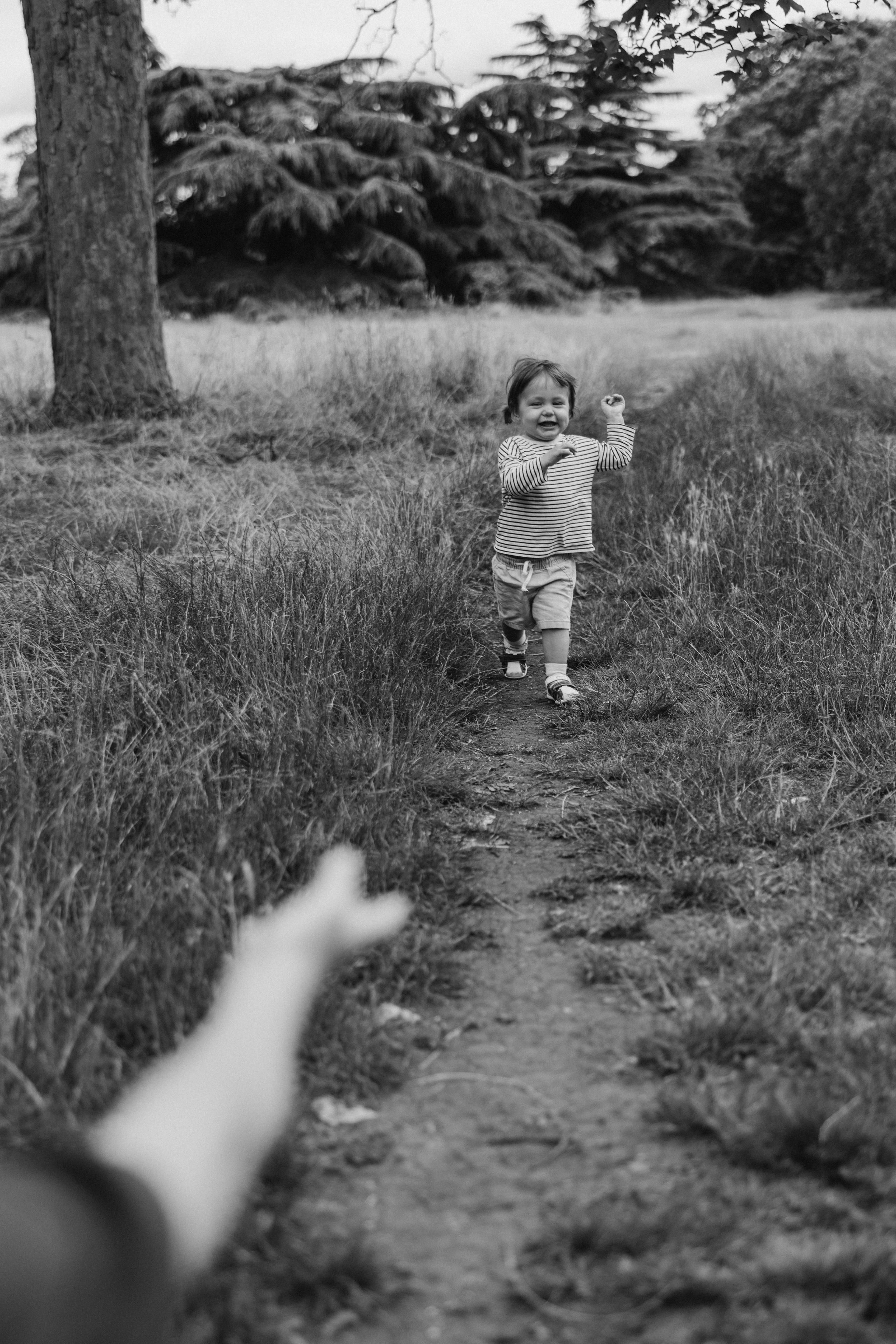 Milena with parents (Greenwich Park). Anastasia Klink, Photographer in London