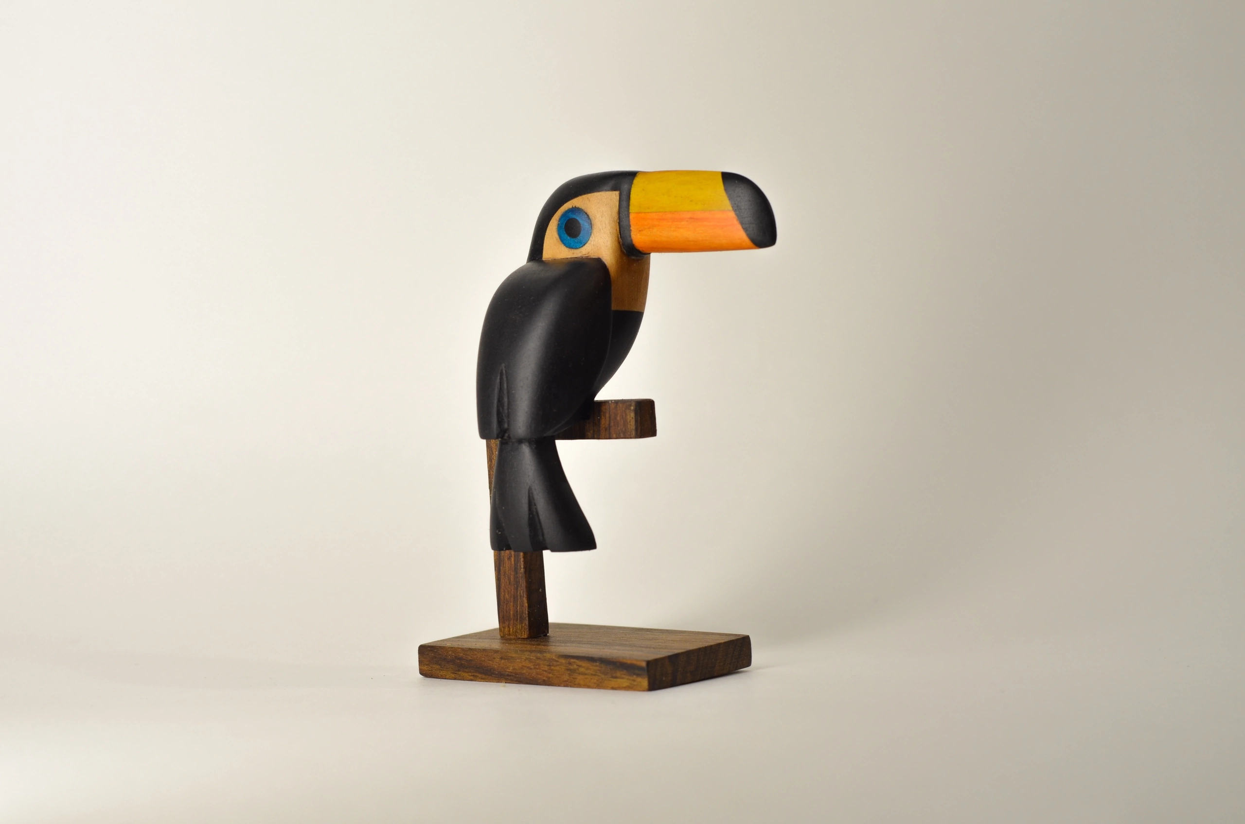 Toucan. Wood carving. Unique decorative sculptures for interior