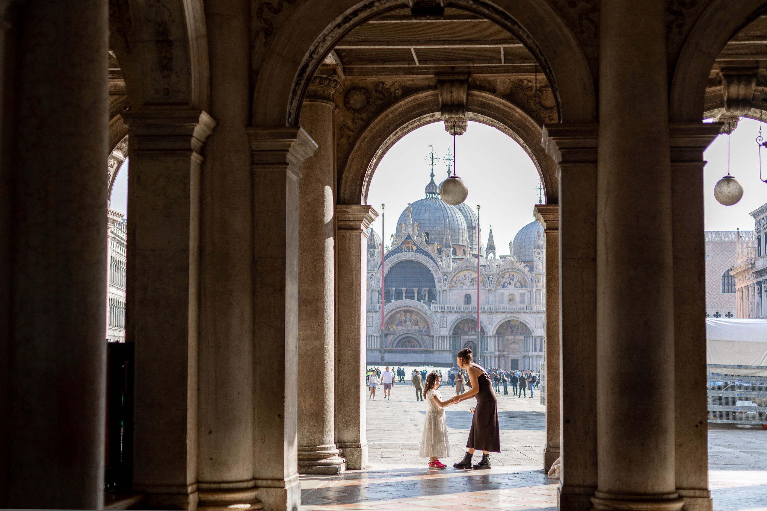 Mother and daughter at sunrise