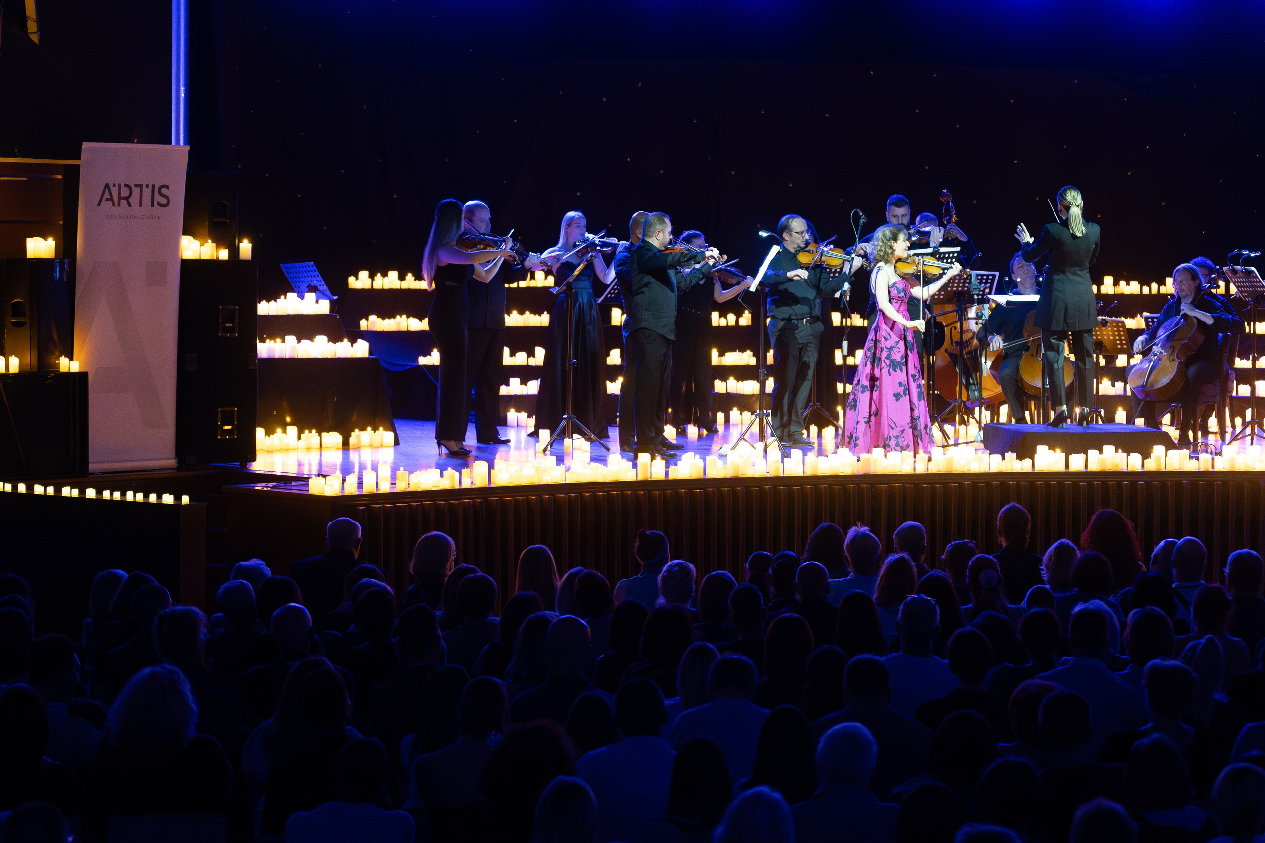 Candlelight Concert Sarajevo is a photography series by photographer Namir Čomaga, presenting the atmosphere of classical music performed in an intimate candlelit setting through concert and event photography.The photographs were created in Sarajevo, Bosnia and Herzegovina, documenting a live classical music performance surrounded by hundreds of candles, capturing musicians, orchestral performance and the unique ambiance of a candlelight concert.This gallery is part of the author's photography portfolio, focusing on Sarajevo photography, Bosnia and Herzegovina photography, concert photography, event photography and classical music performance photography.